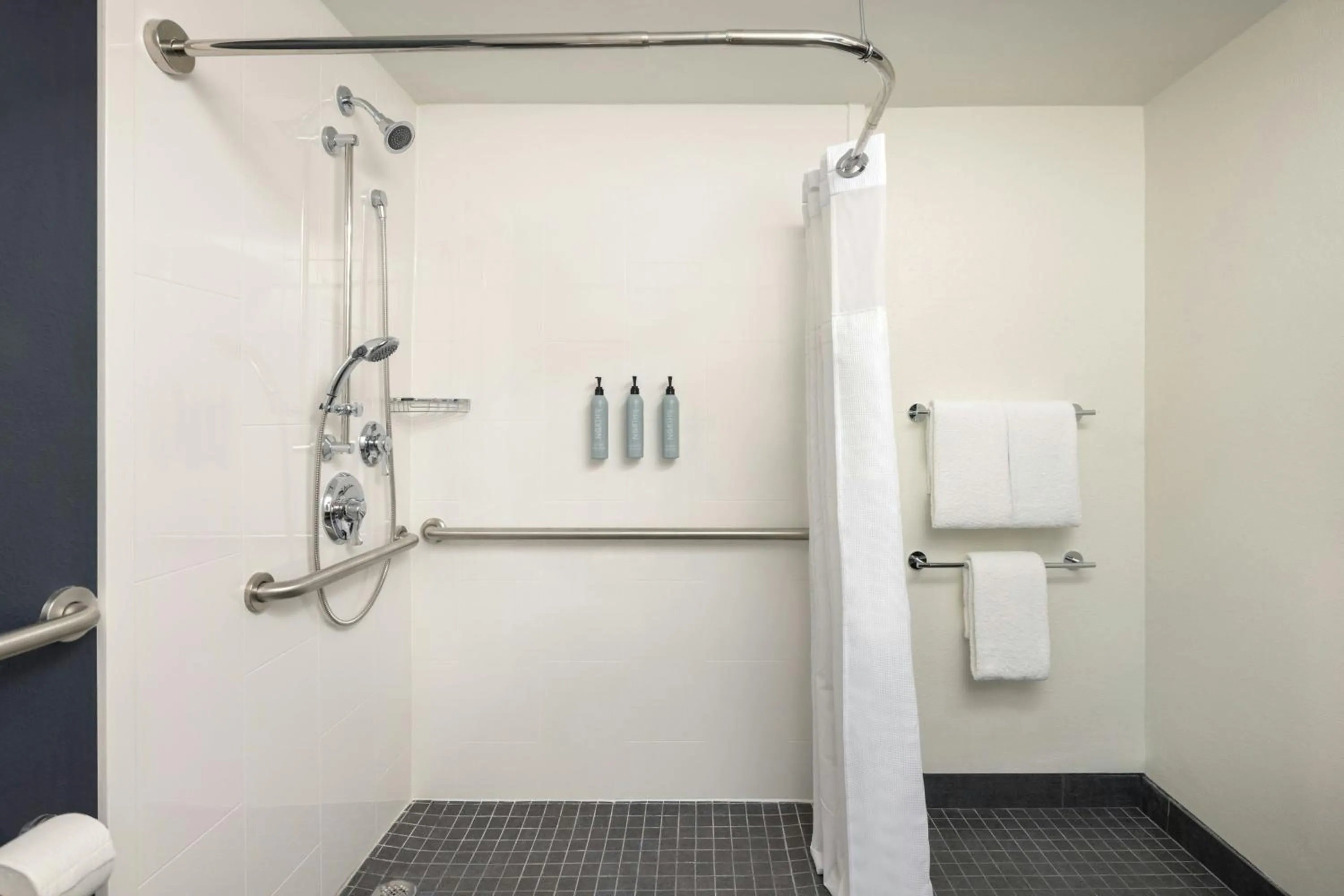 Bathroom in Courtyard by Marriott across Universal Orlando