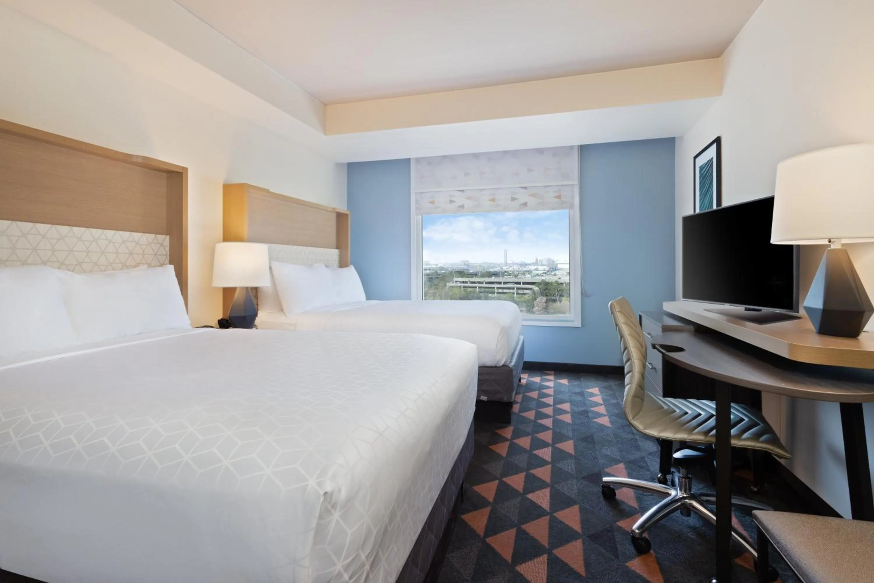 Photo of the whole room, Bed in Holiday Inn & Suites Across from Universal Orlando by IHG