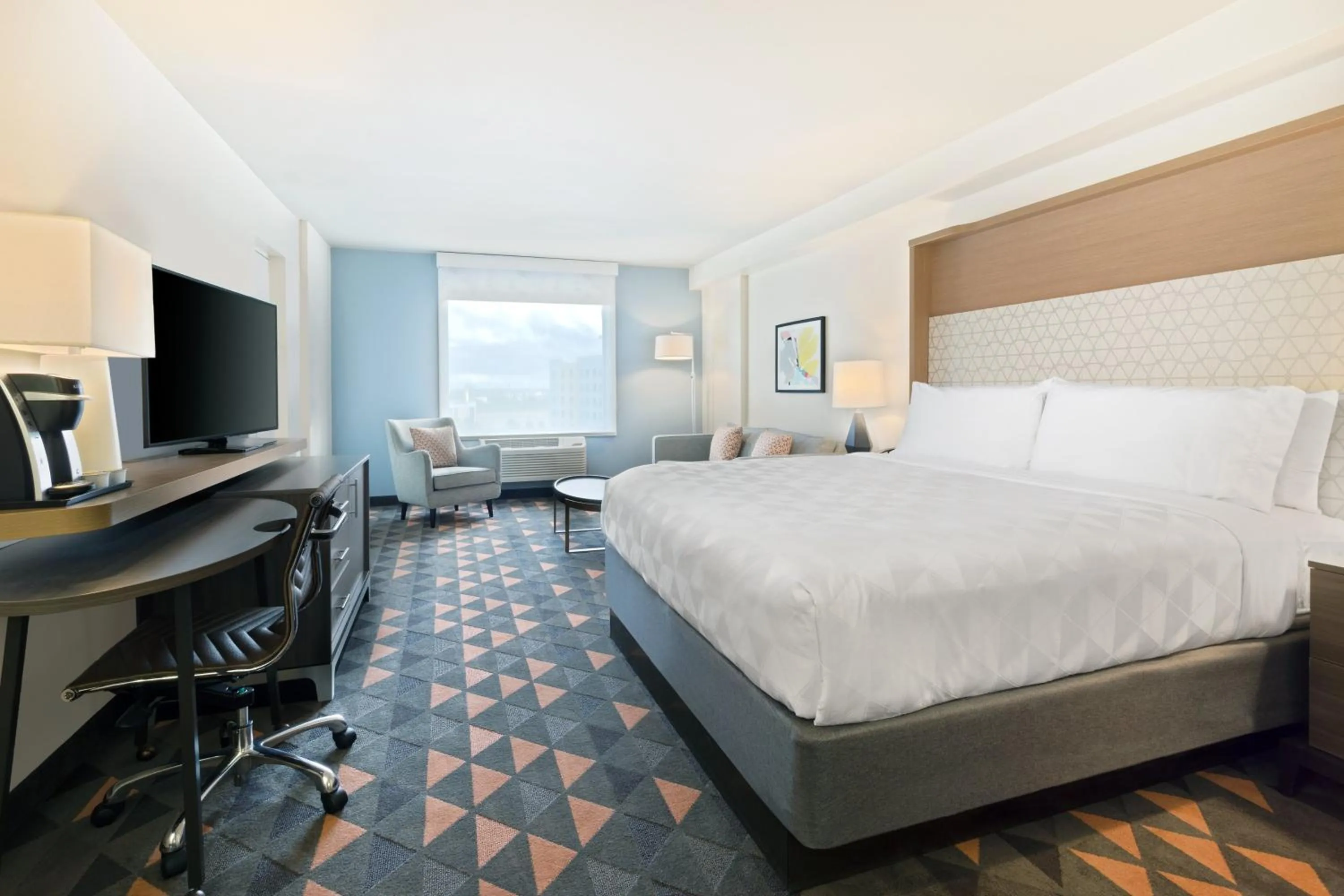 Photo of the whole room, Bed in Holiday Inn & Suites Across from Universal Orlando by IHG