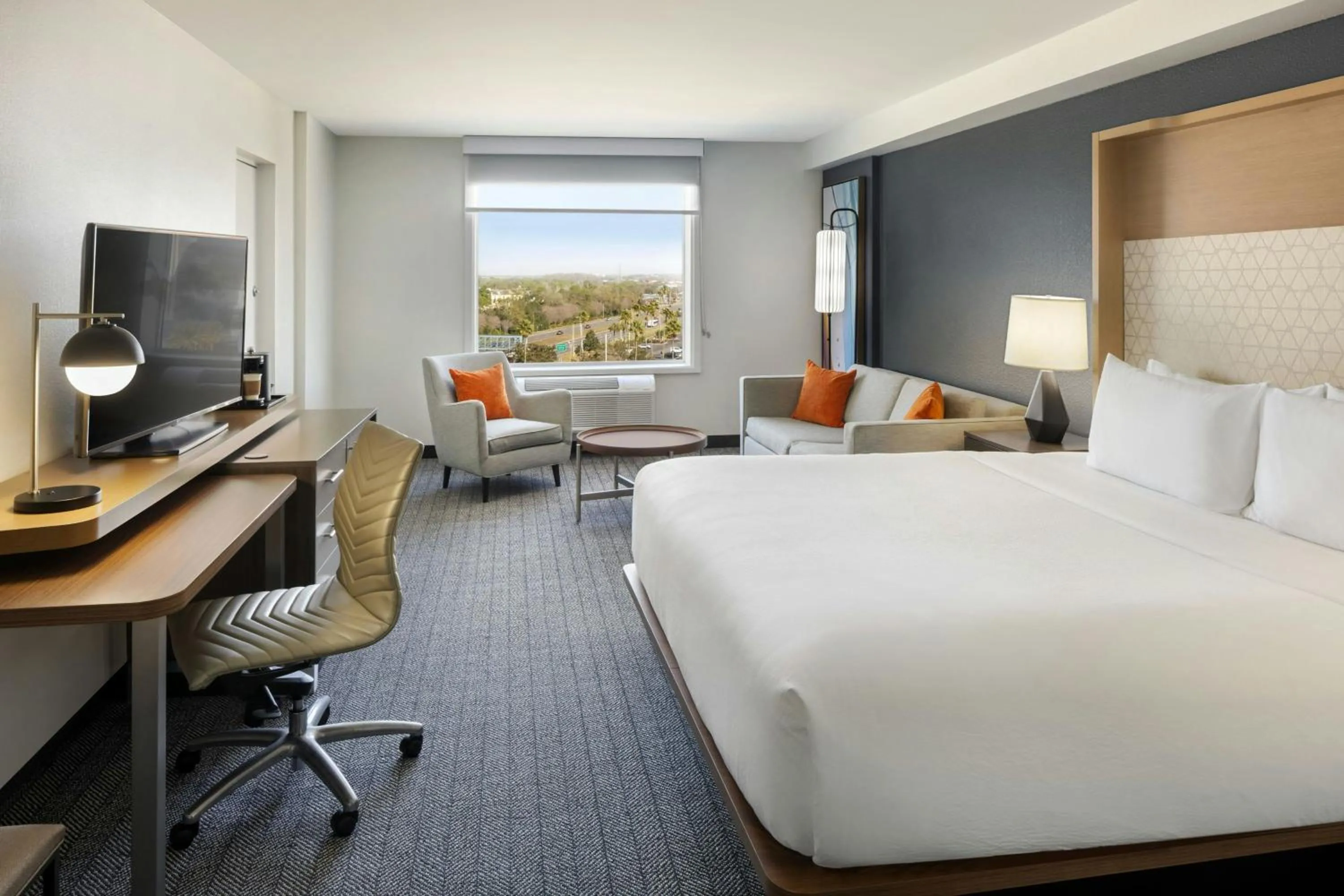 Photo of the whole room, Bed in Courtyard by Marriott across Universal Orlando
