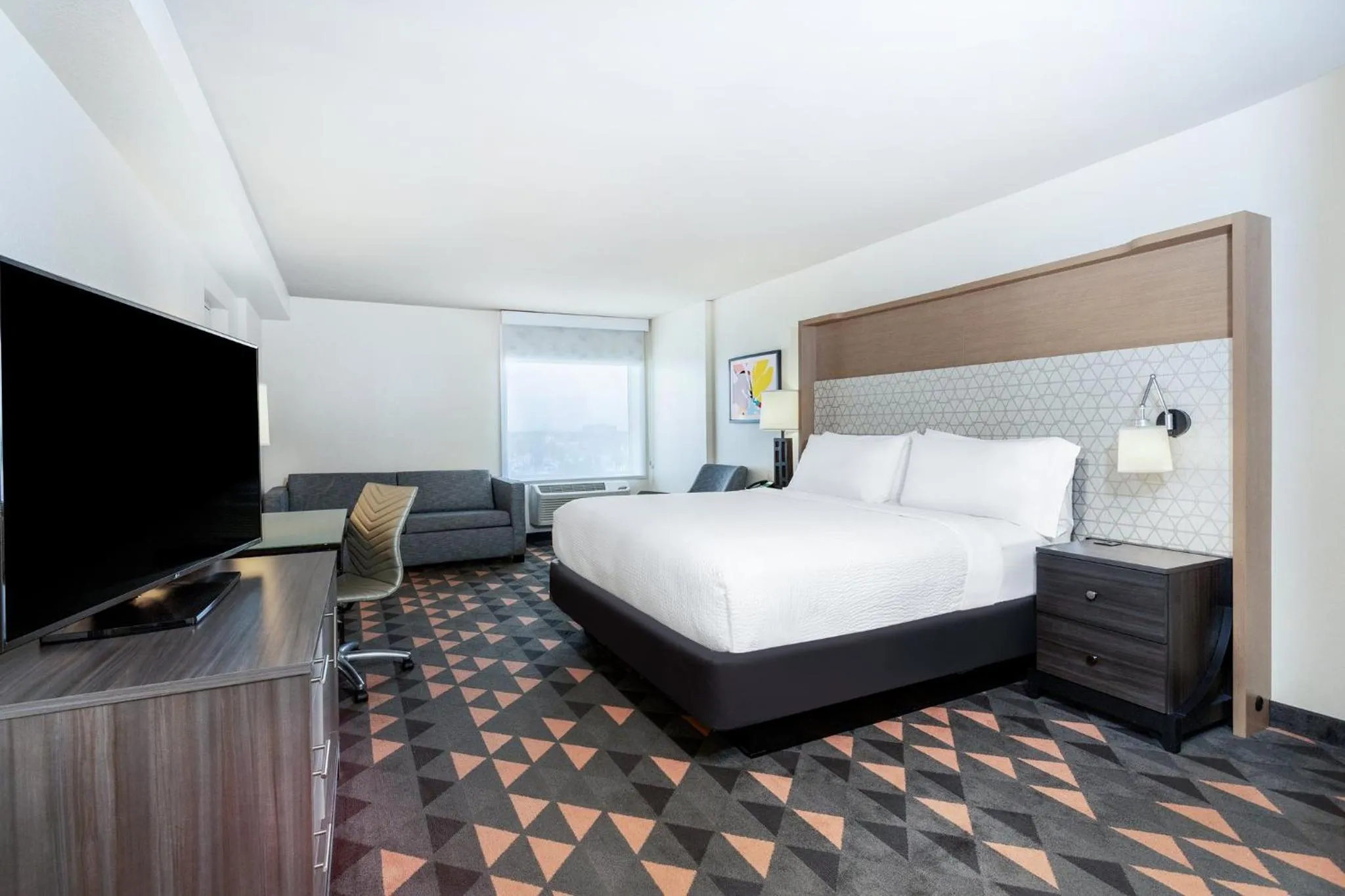 Photo of the whole room, Bed in Holiday Inn & Suites Across from Universal Orlando by IHG