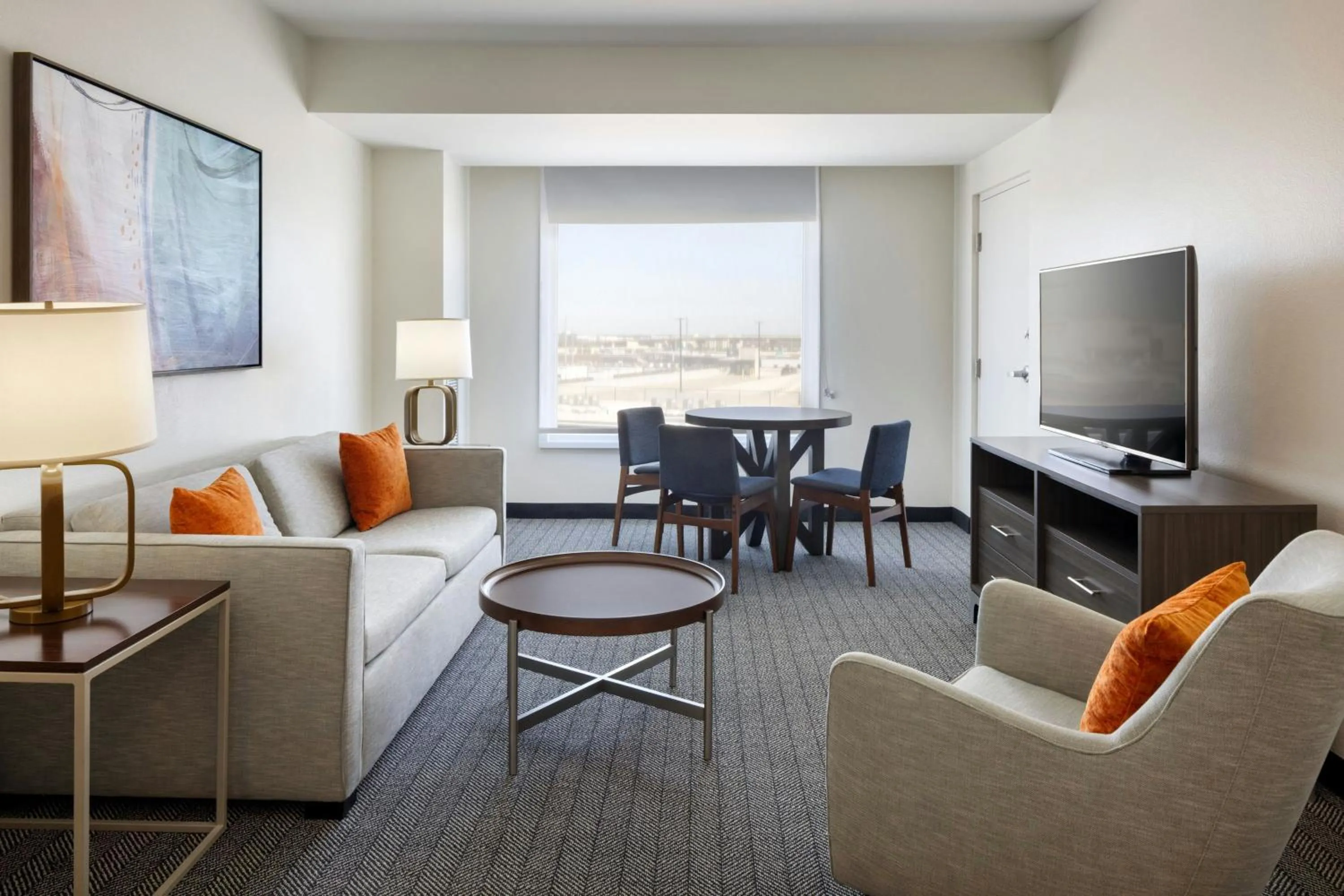 Living room in Courtyard by Marriott across Universal Orlando