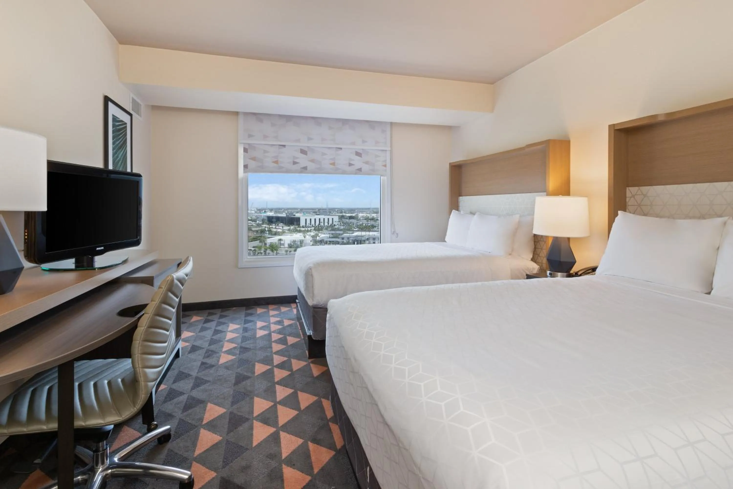 Photo of the whole room, Bed in Holiday Inn & Suites Across from Universal Orlando by IHG