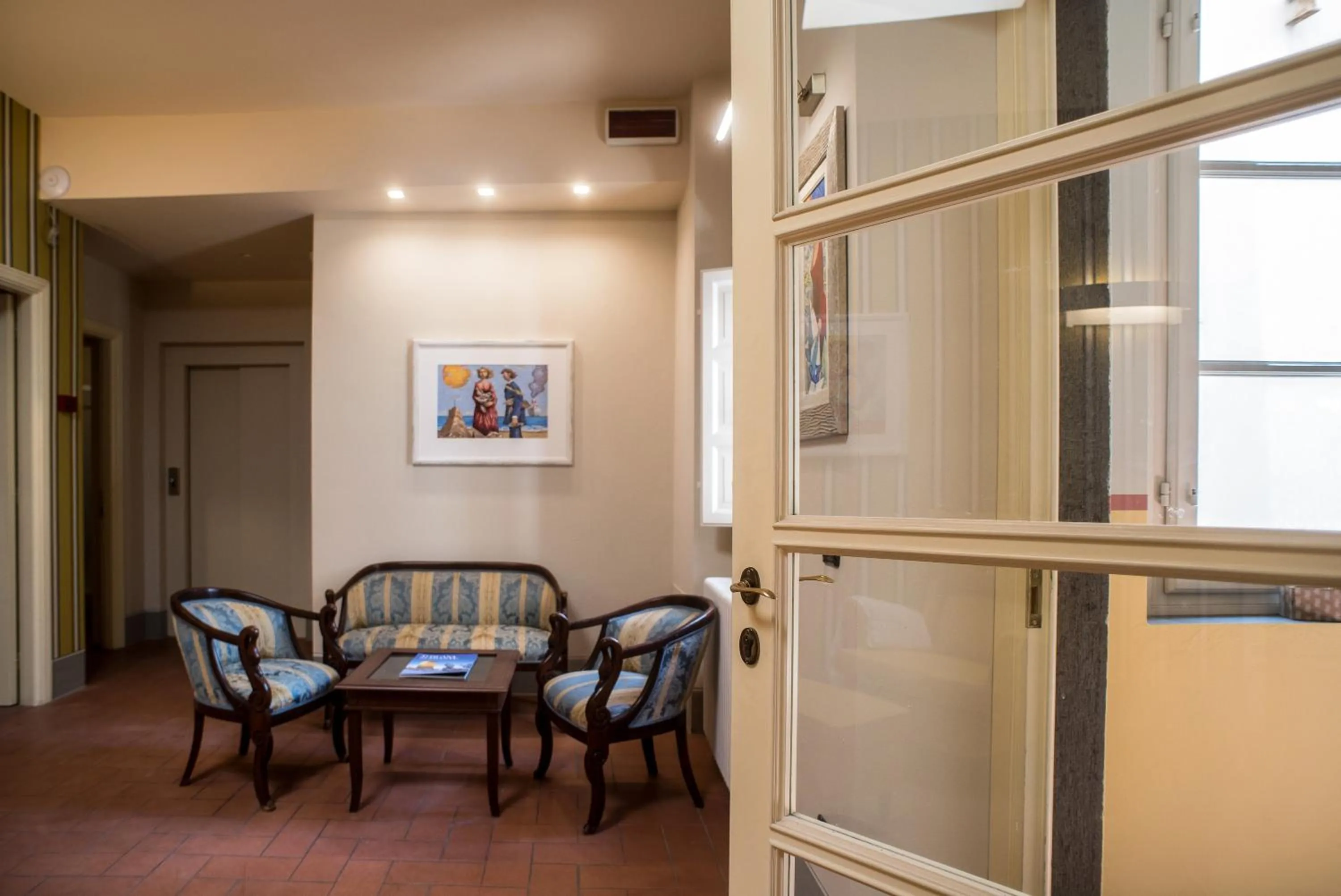 Communal lounge/ TV room in B&B Residenza Di Via Fontana