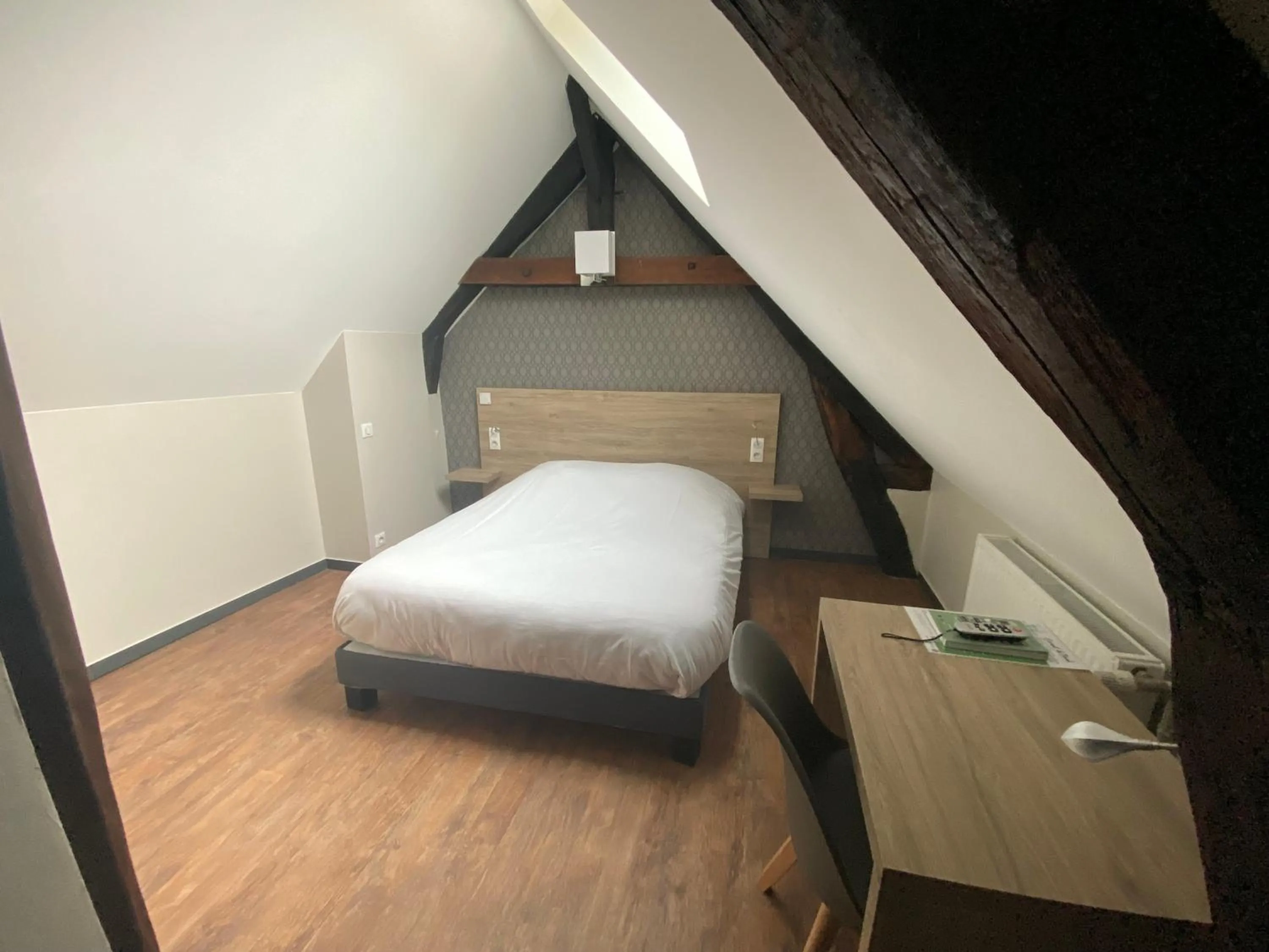 Photo of the whole room, Bed in LOGIS - Hôtel & Restaurant Saint Nicolas