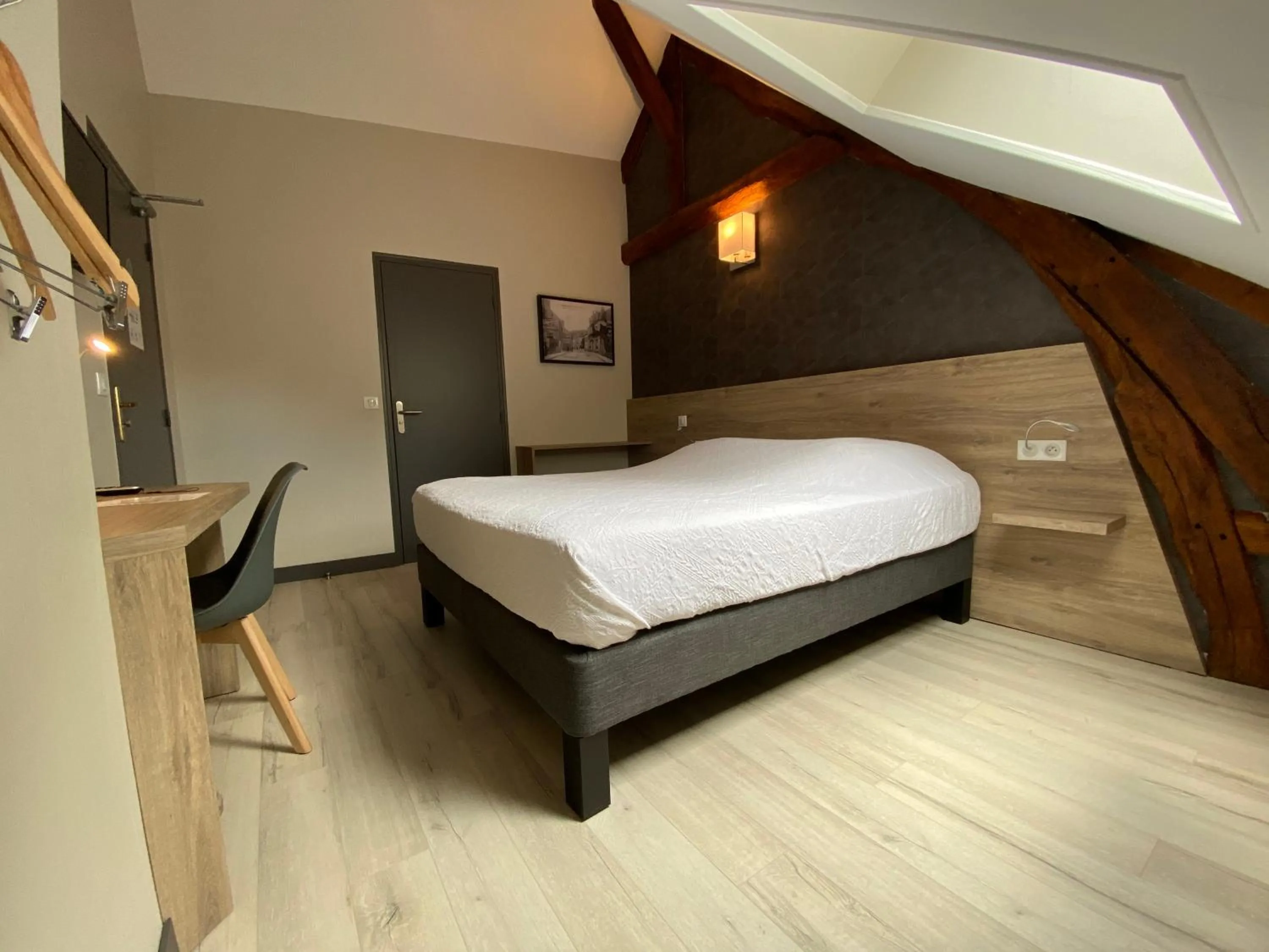 Photo of the whole room, Bed in LOGIS - Hôtel & Restaurant Saint Nicolas