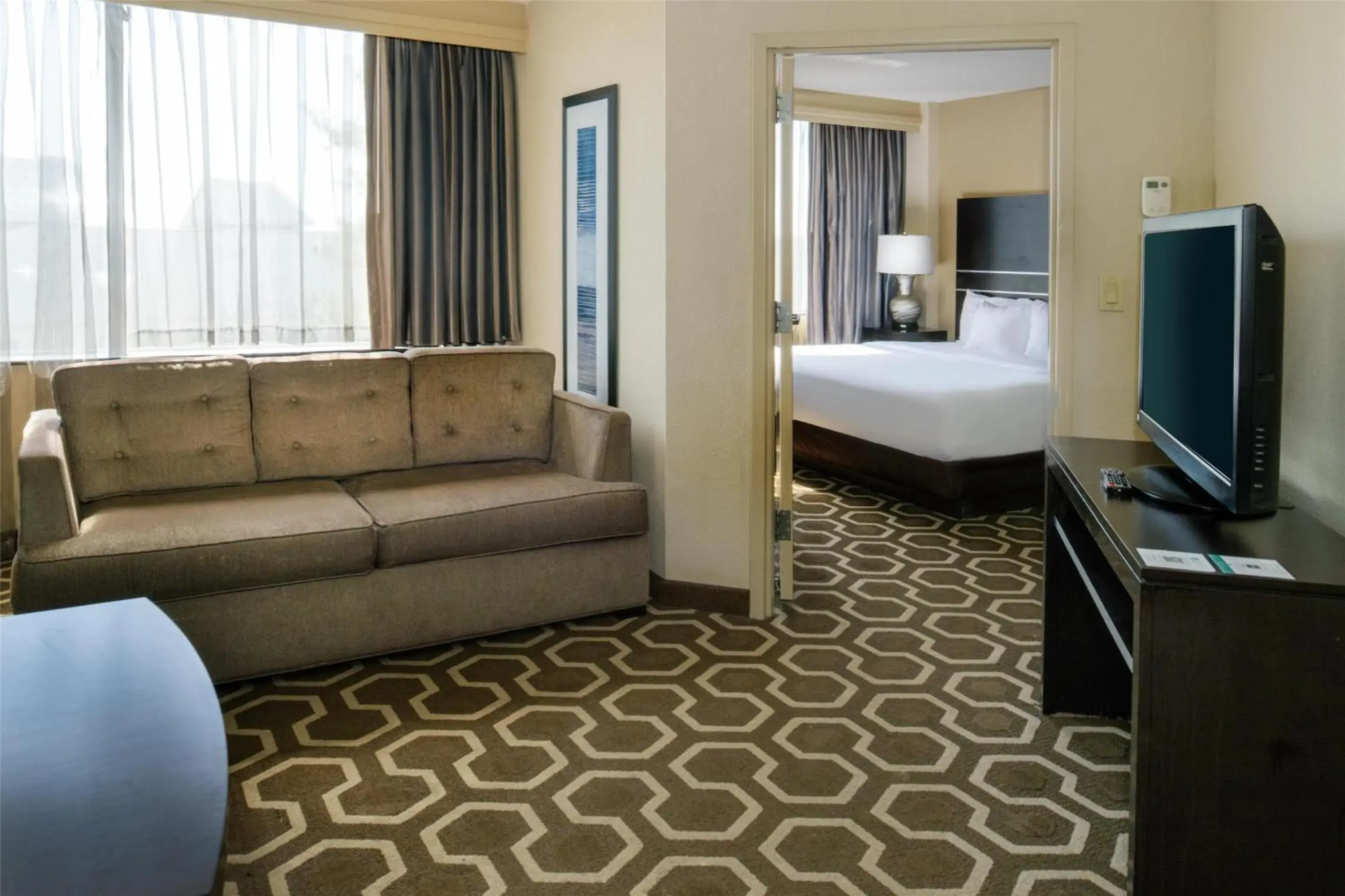 Living room, Bed in Embassy Suites by Hilton St Louis Airport Living room, Bed in Embassy Suites by Hilton St Louis Airport