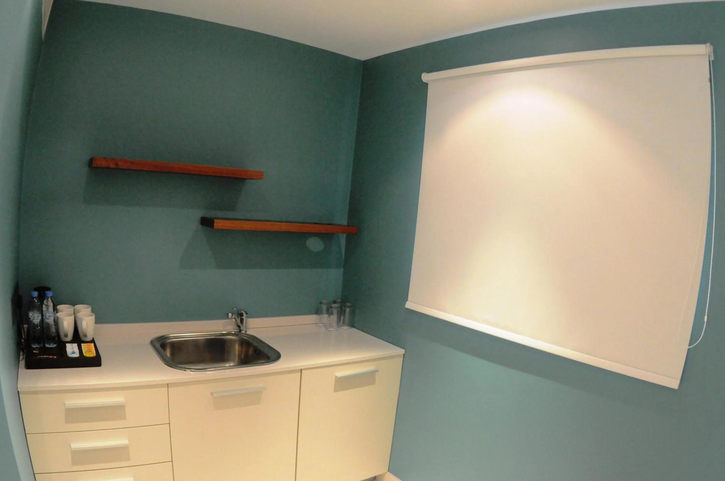 Kitchen or kitchenette in AlBander Hotel & Resort