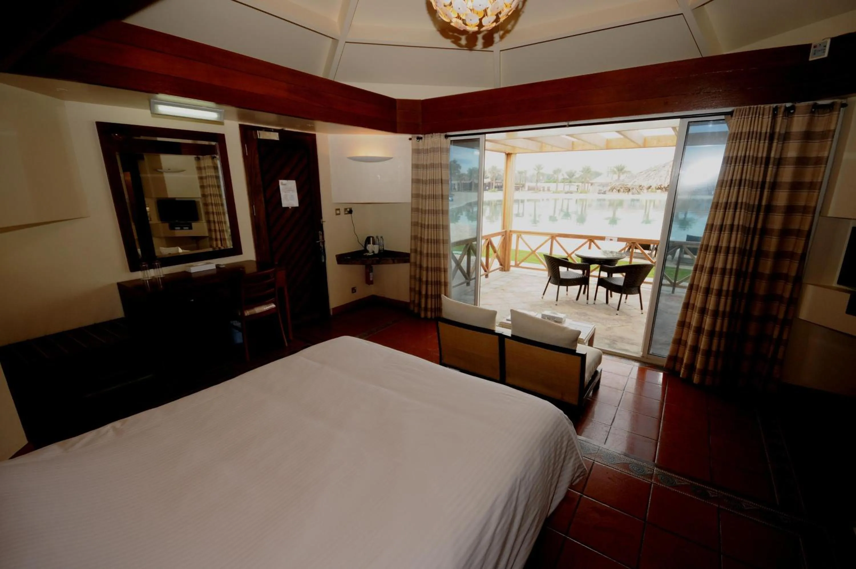 Balcony/Terrace, Bed in AlBander Hotel & Resort