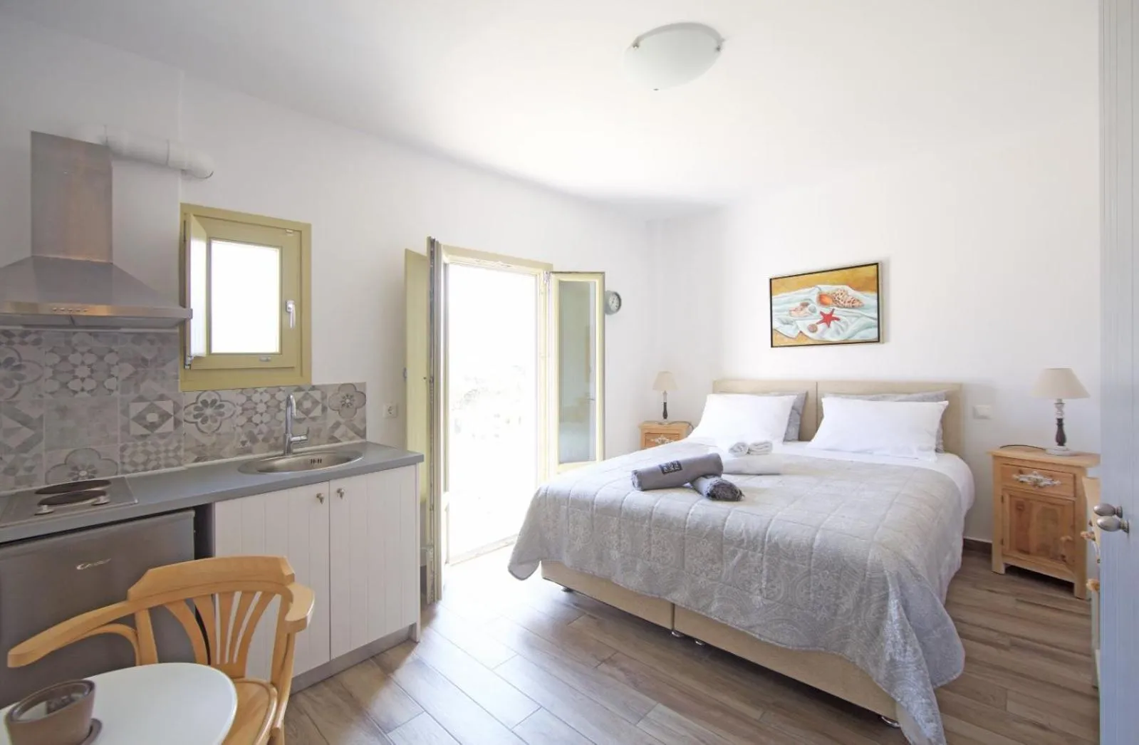 Photo of the whole room, Bed in Diasino Apartments and Car Rental