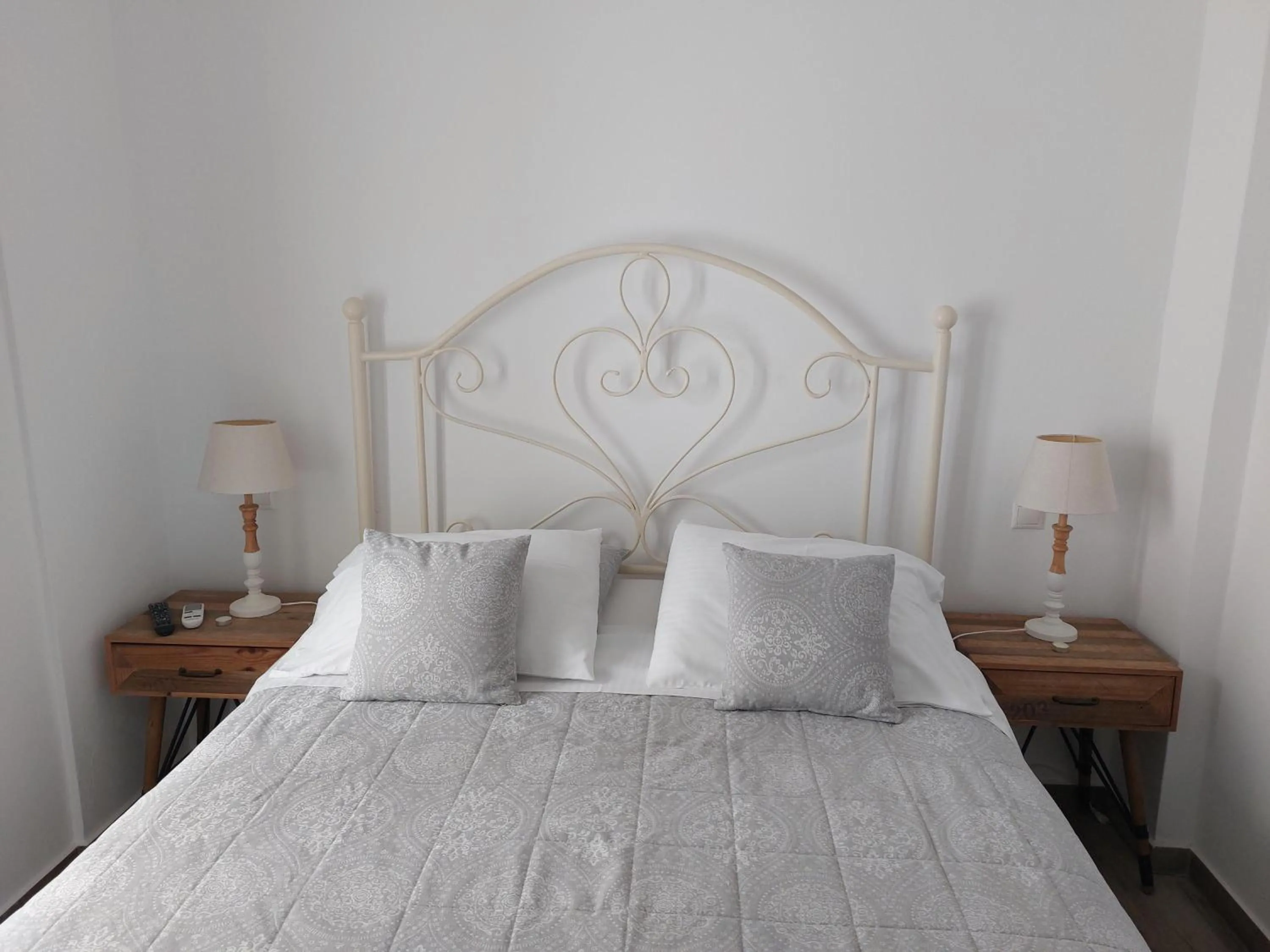 Bed in Diasino Apartments and Car Rental