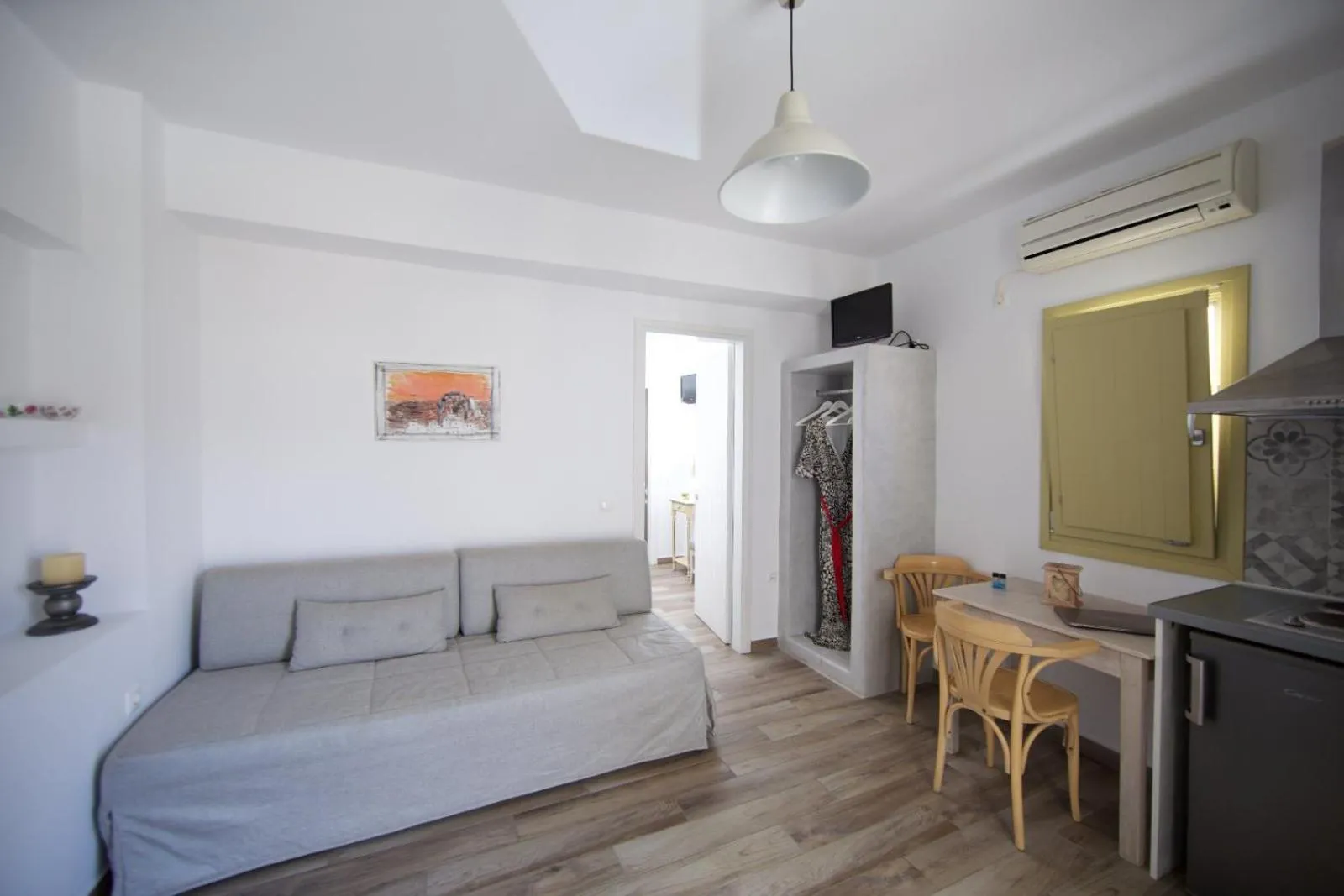 Kitchen or kitchenette, Bed in Diasino Apartments and Car Rental