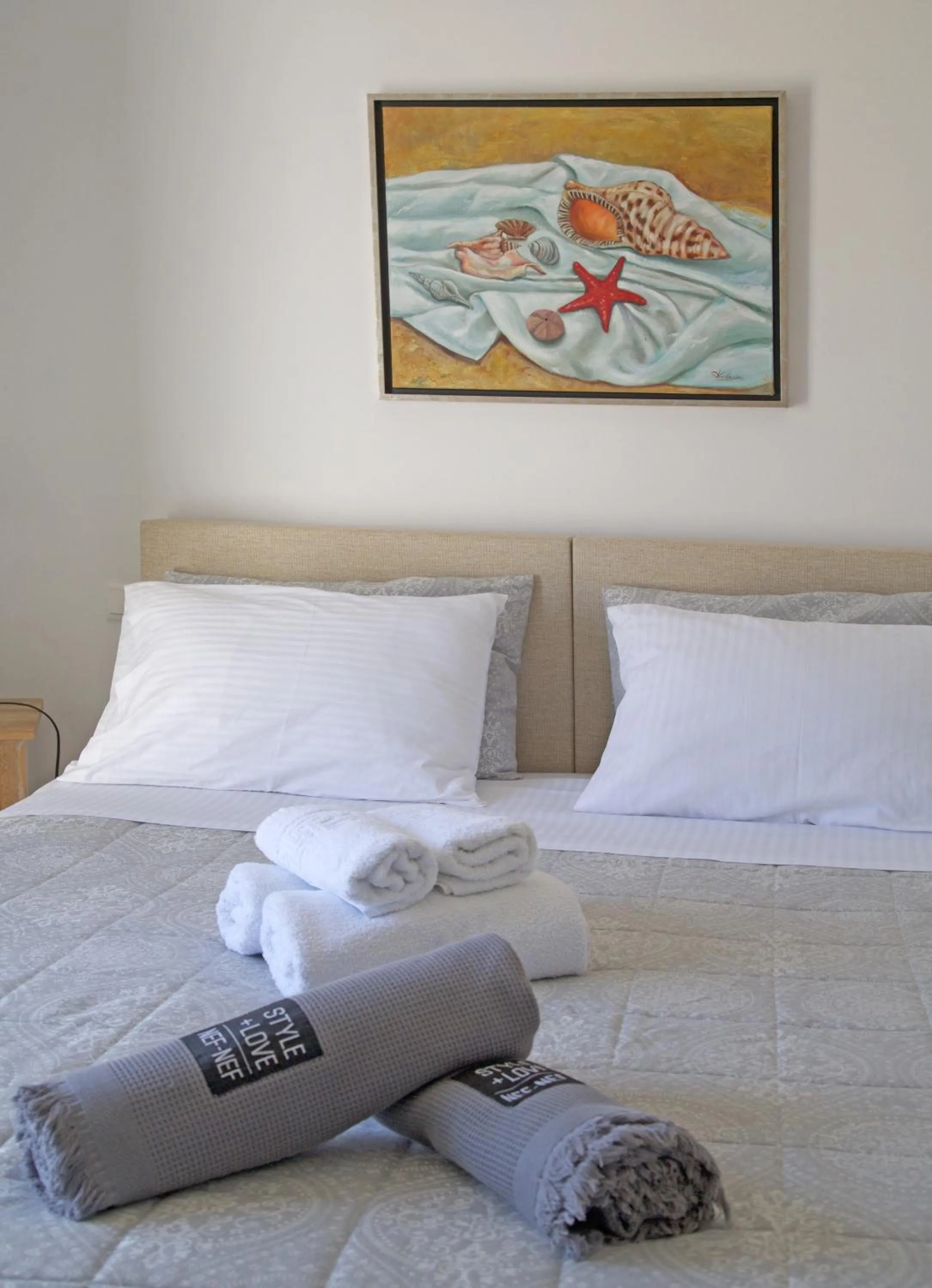 Bed in Diasino Apartments and Car Rental