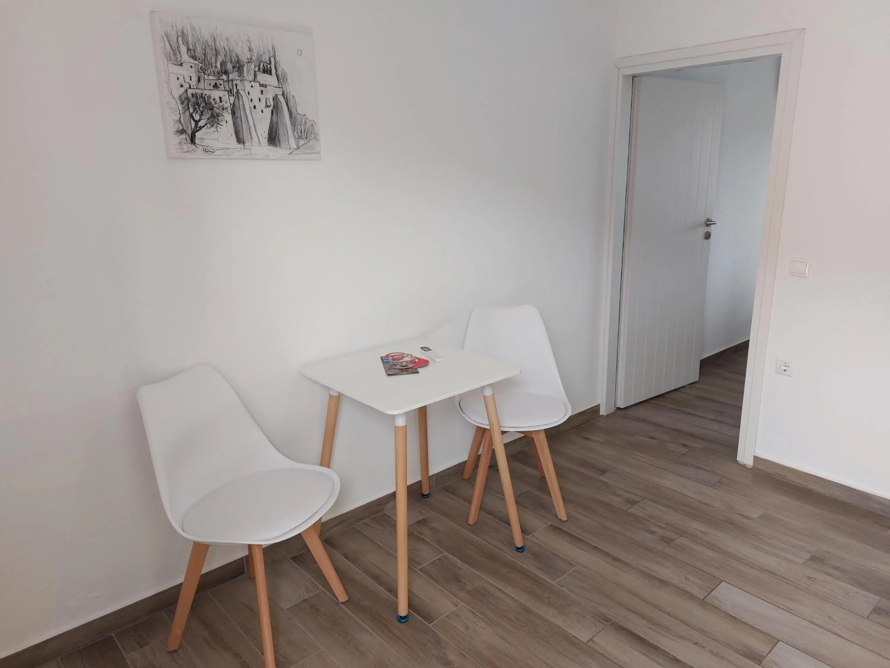 Seating area in Diasino Apartments and Car Rental