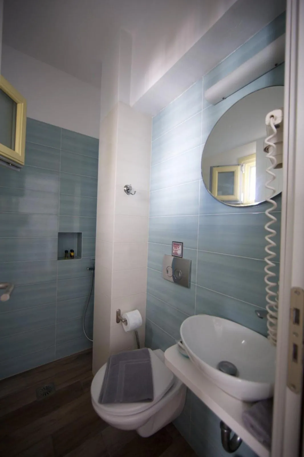 Shower in Diasino Apartments and Car Rental
