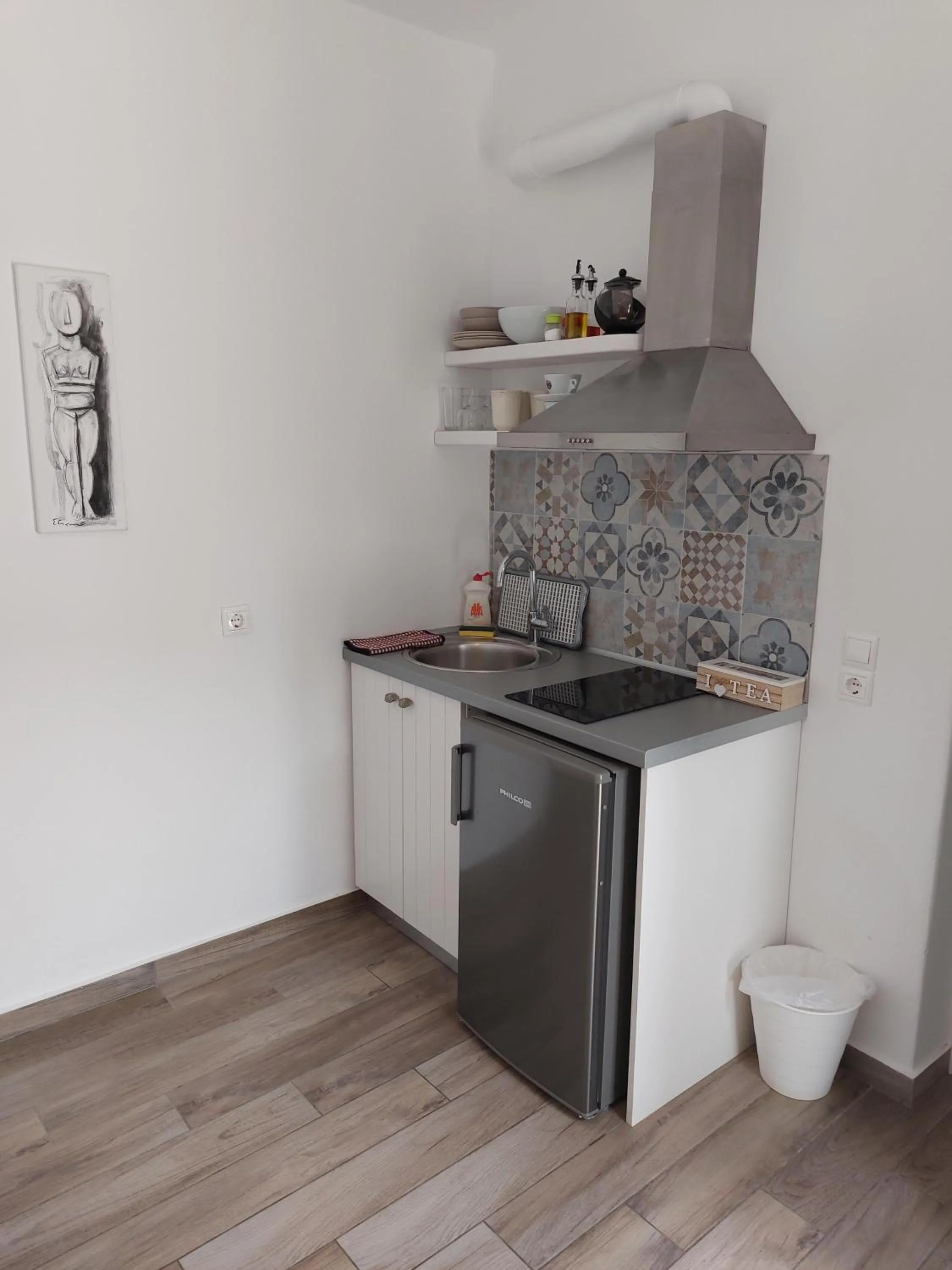 Kitchen or kitchenette in Diasino Apartments and Car Rental