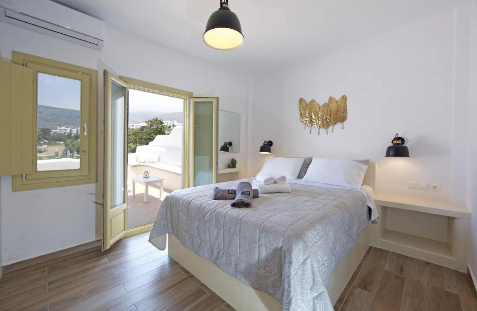 Photo of the whole room, Bed in Diasino Apartments and Car Rental