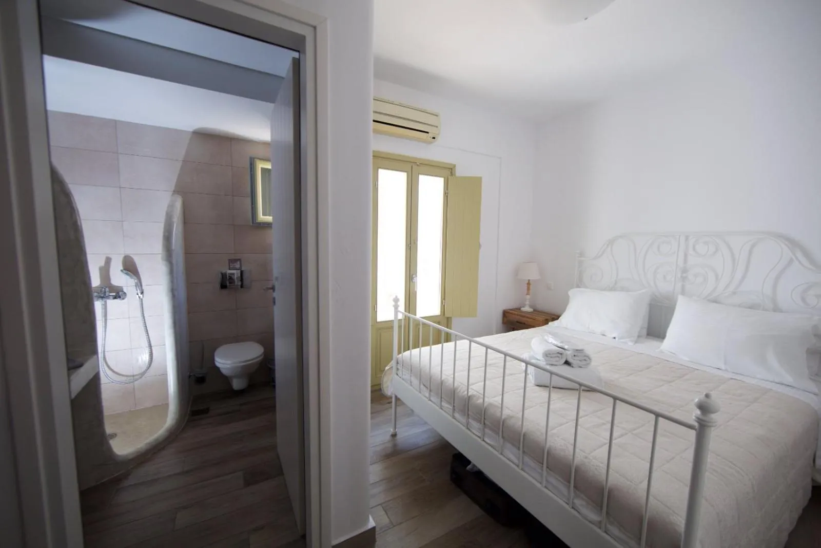 Bed in Diasino Apartments and Car Rental