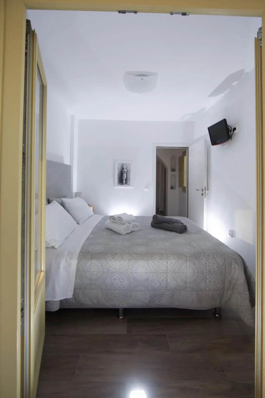 Bed in Diasino Apartments and Car Rental