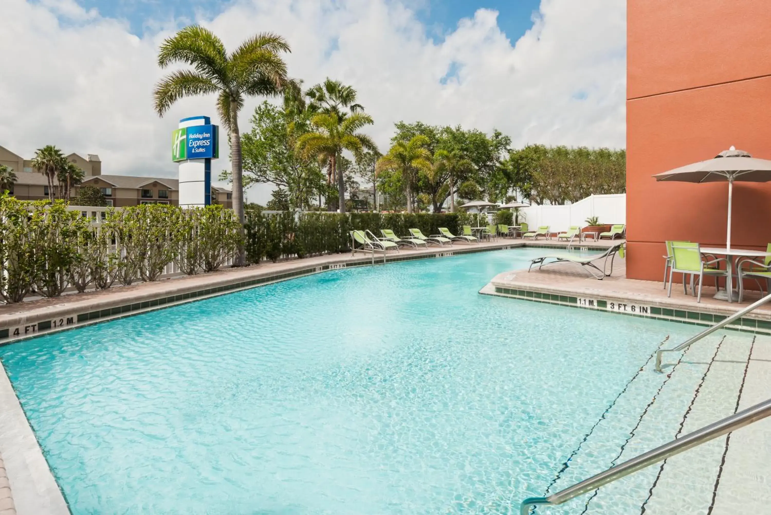 Swimming pool in Holiday Inn Express & Suites - Nearest Universal Orlando by IHG Swimming pool in Holiday Inn Express & Suites - Nearest Universal Orlando by IHG