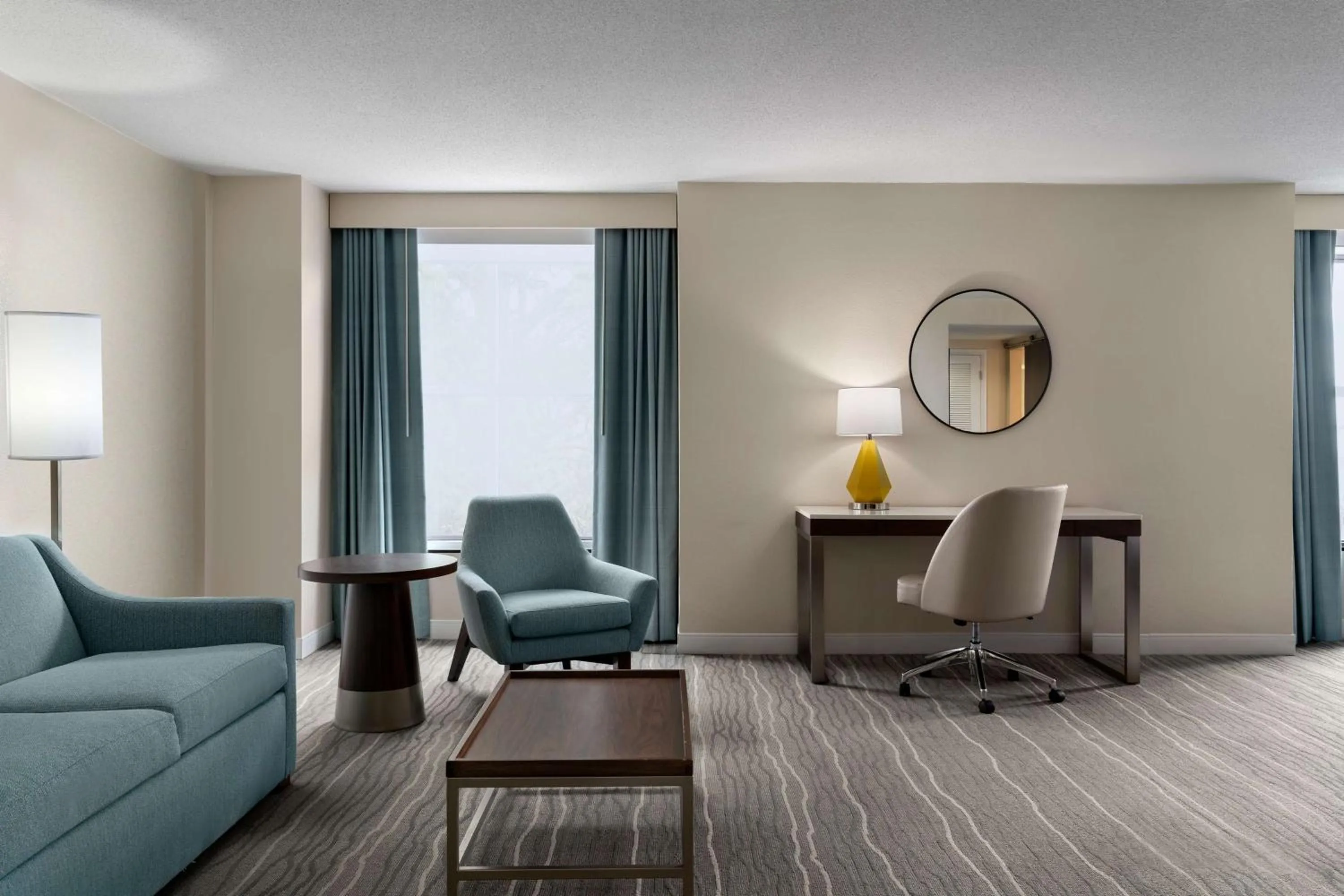 Living room in DoubleTree by Hilton Norfolk Airport