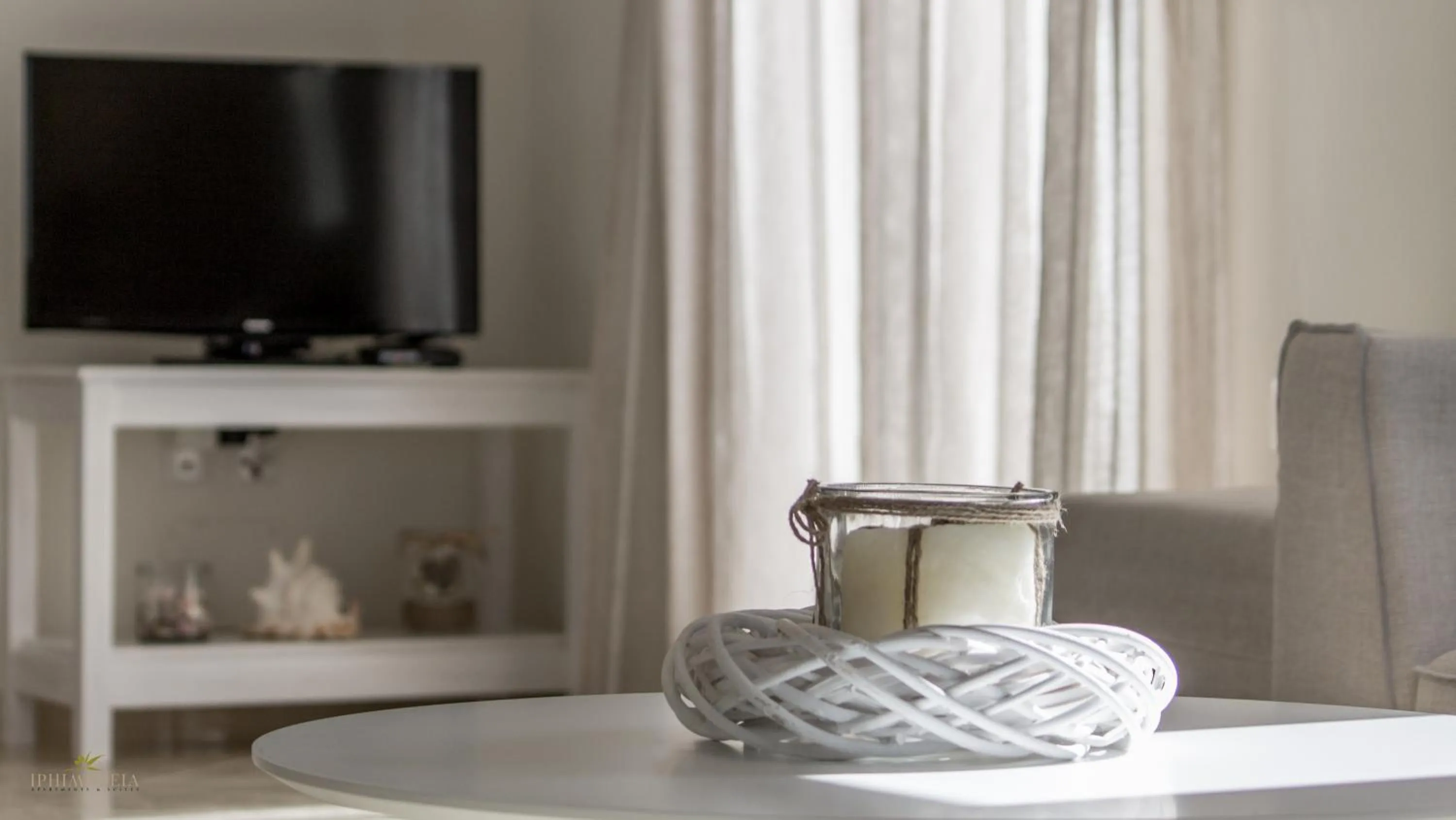 TV and multimedia in Iphimedeia Luxury Hotel & Suites