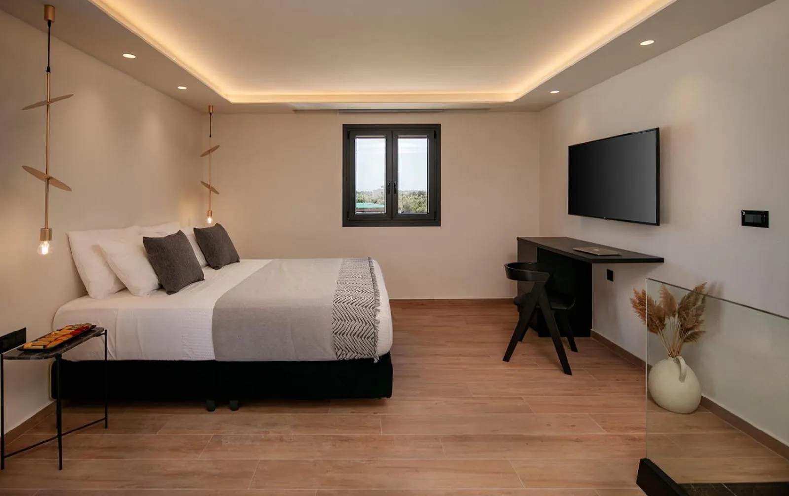 Bed in Iphimedeia Luxury Hotel & Suites