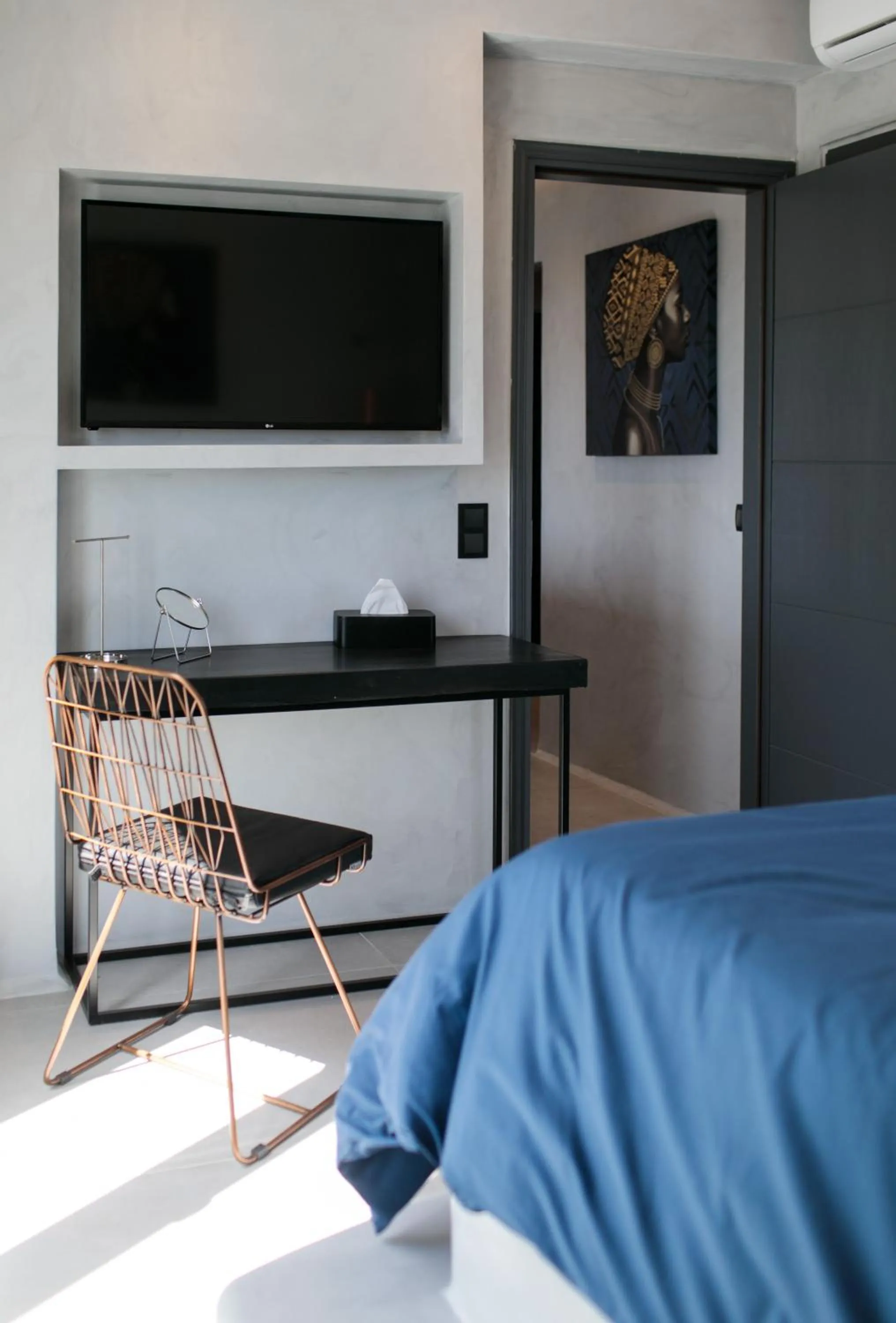 Bed in Iphimedeia Luxury Hotel & Suites