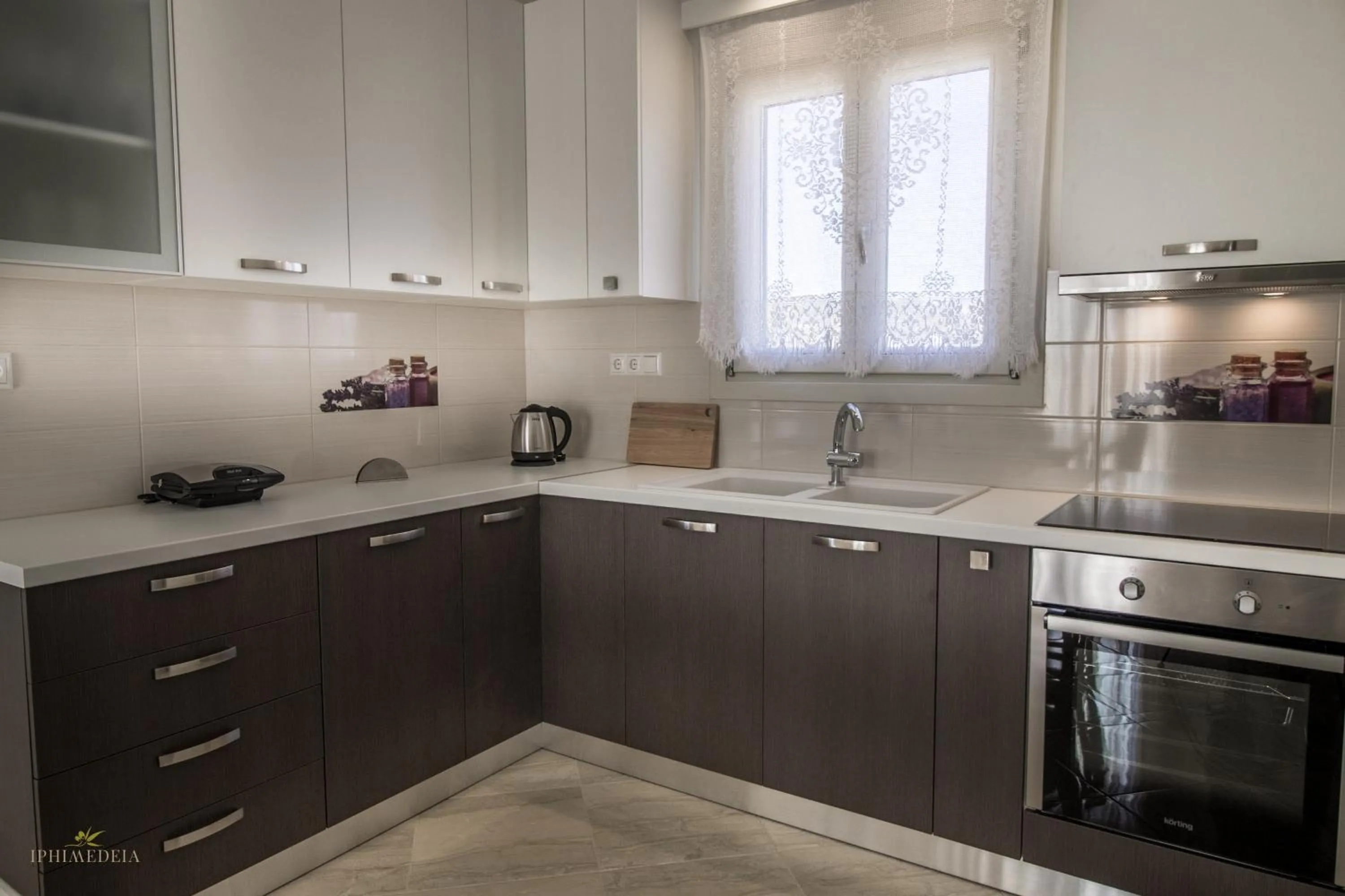 Kitchen or kitchenette in Iphimedeia Luxury Hotel & Suites