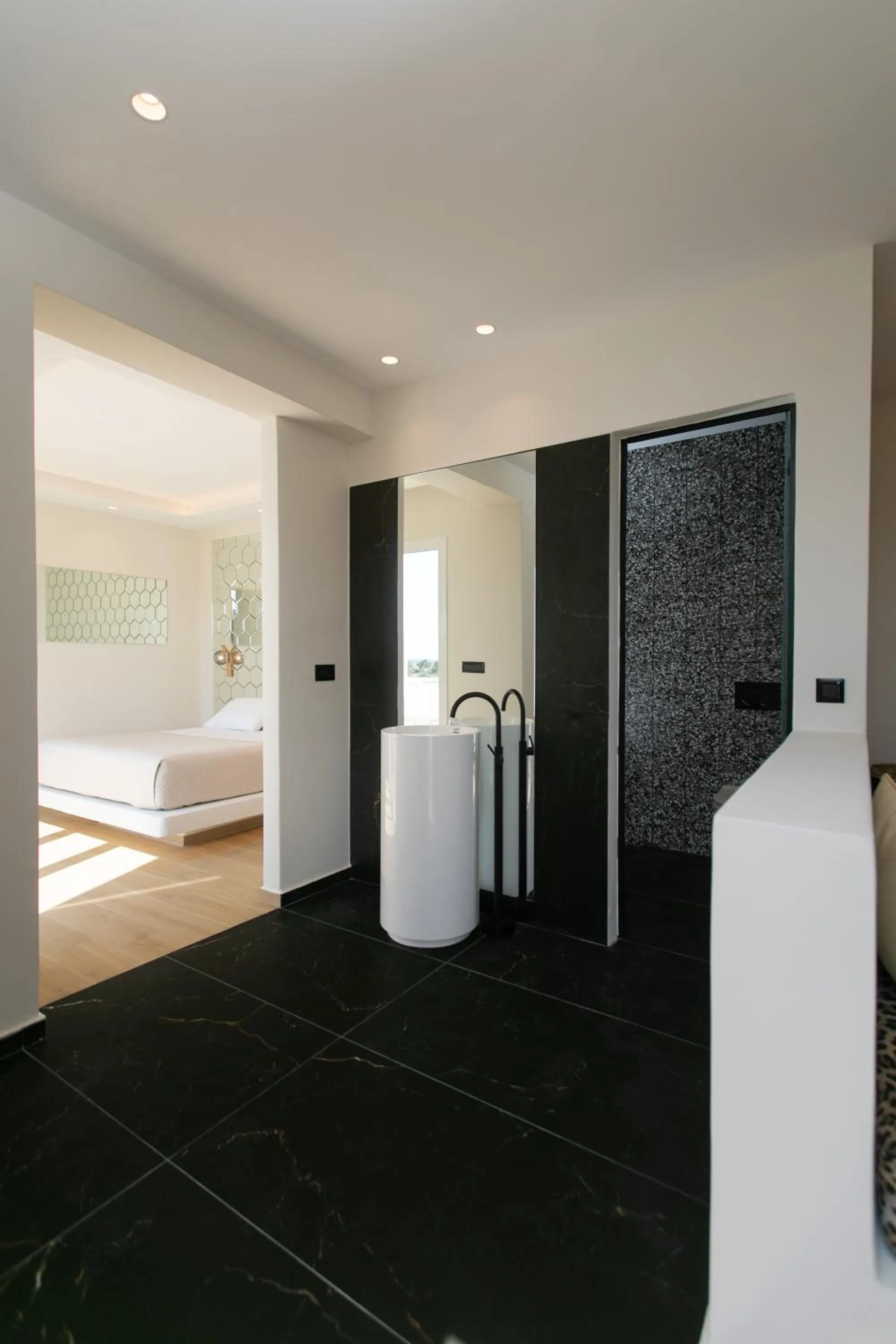 Bed in Iphimedeia Luxury Hotel & Suites