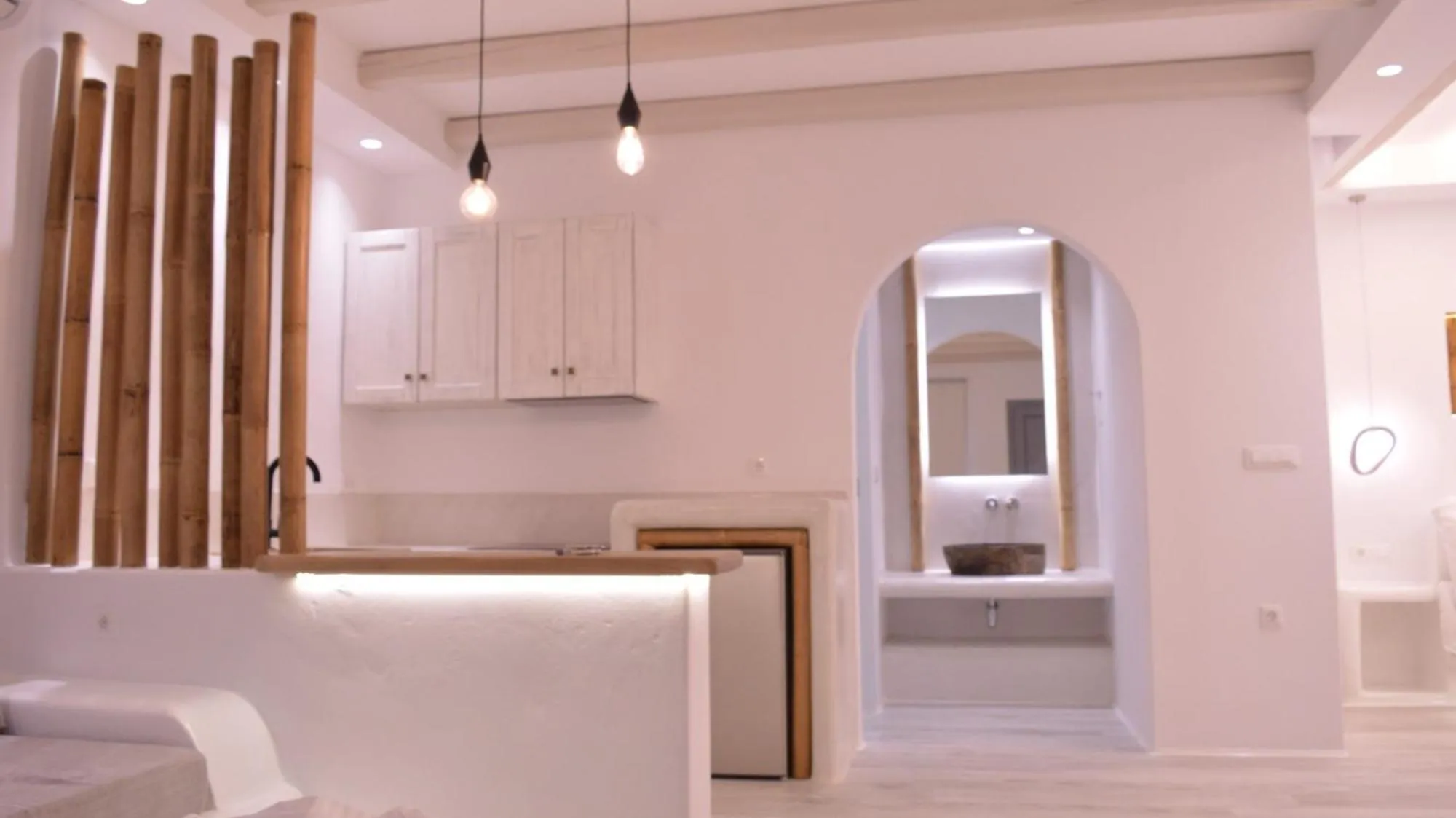 Bed in Iphimedeia Luxury Hotel & Suites