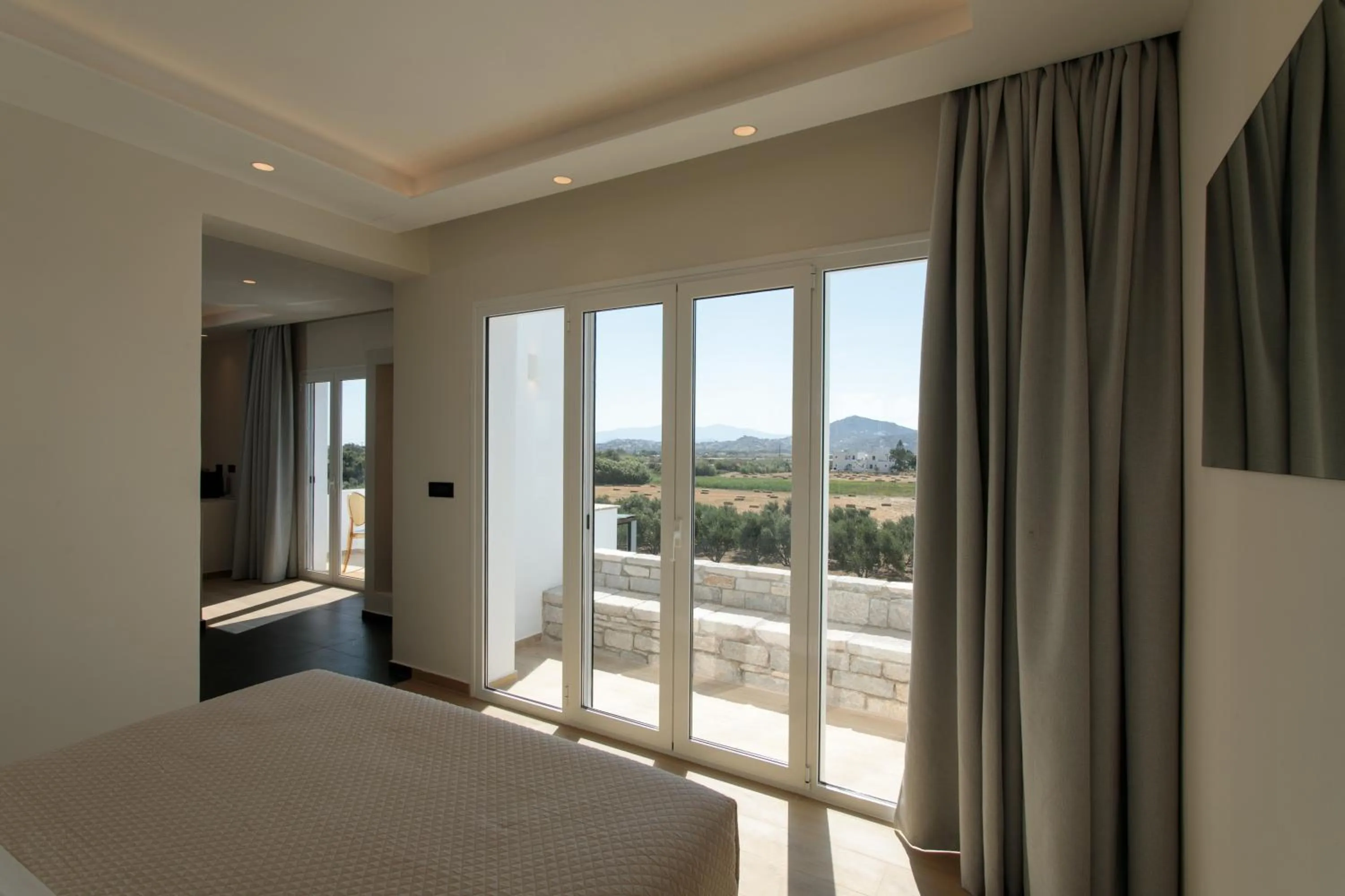 Bed in Iphimedeia Luxury Hotel & Suites