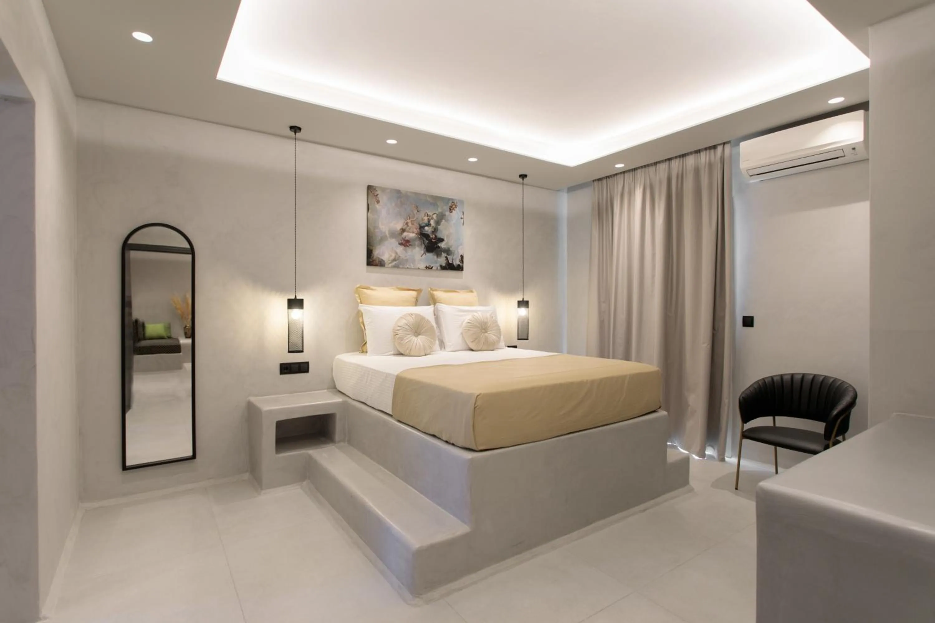 Bed in Iphimedeia Luxury Hotel & Suites