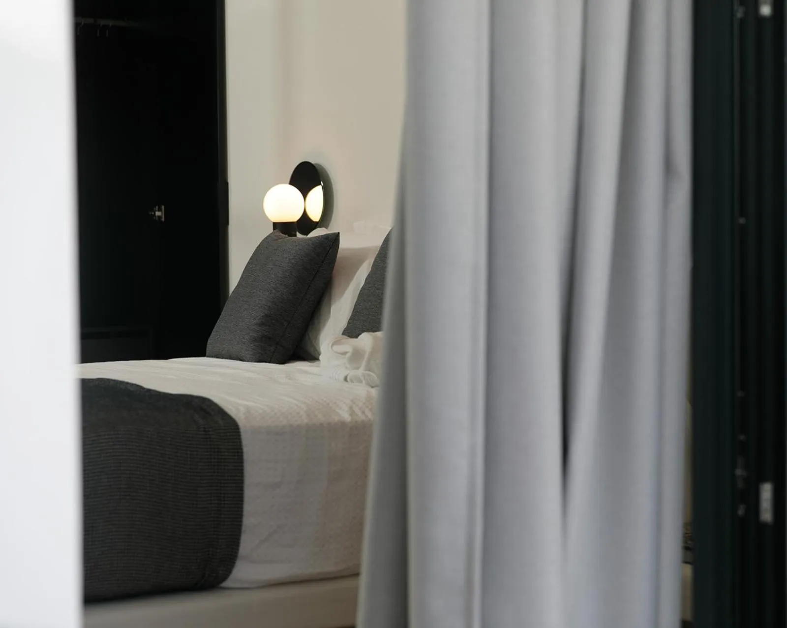 Bed in Iphimedeia Luxury Hotel & Suites