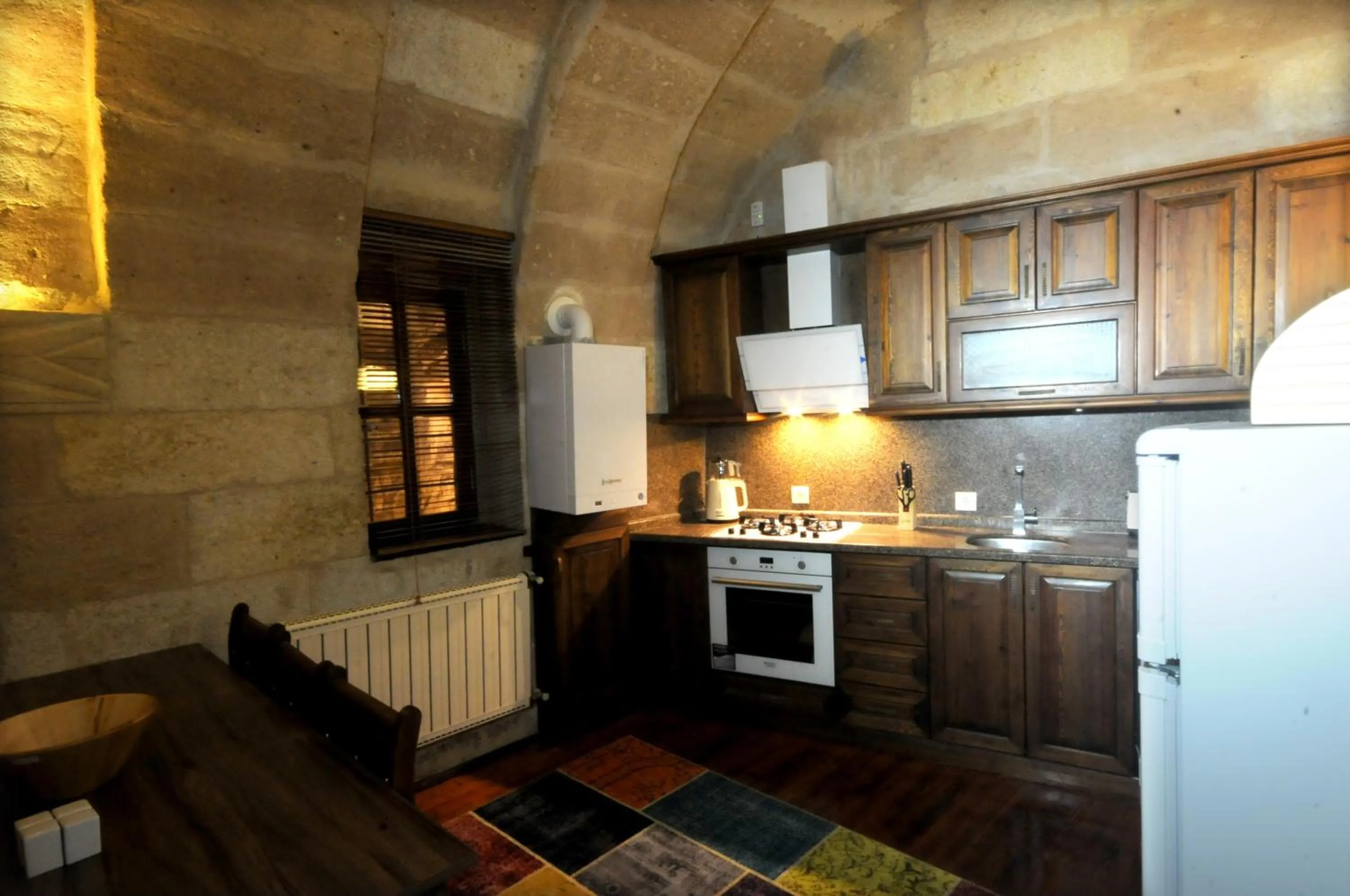 Communal kitchen in Kayhan Cave Villa