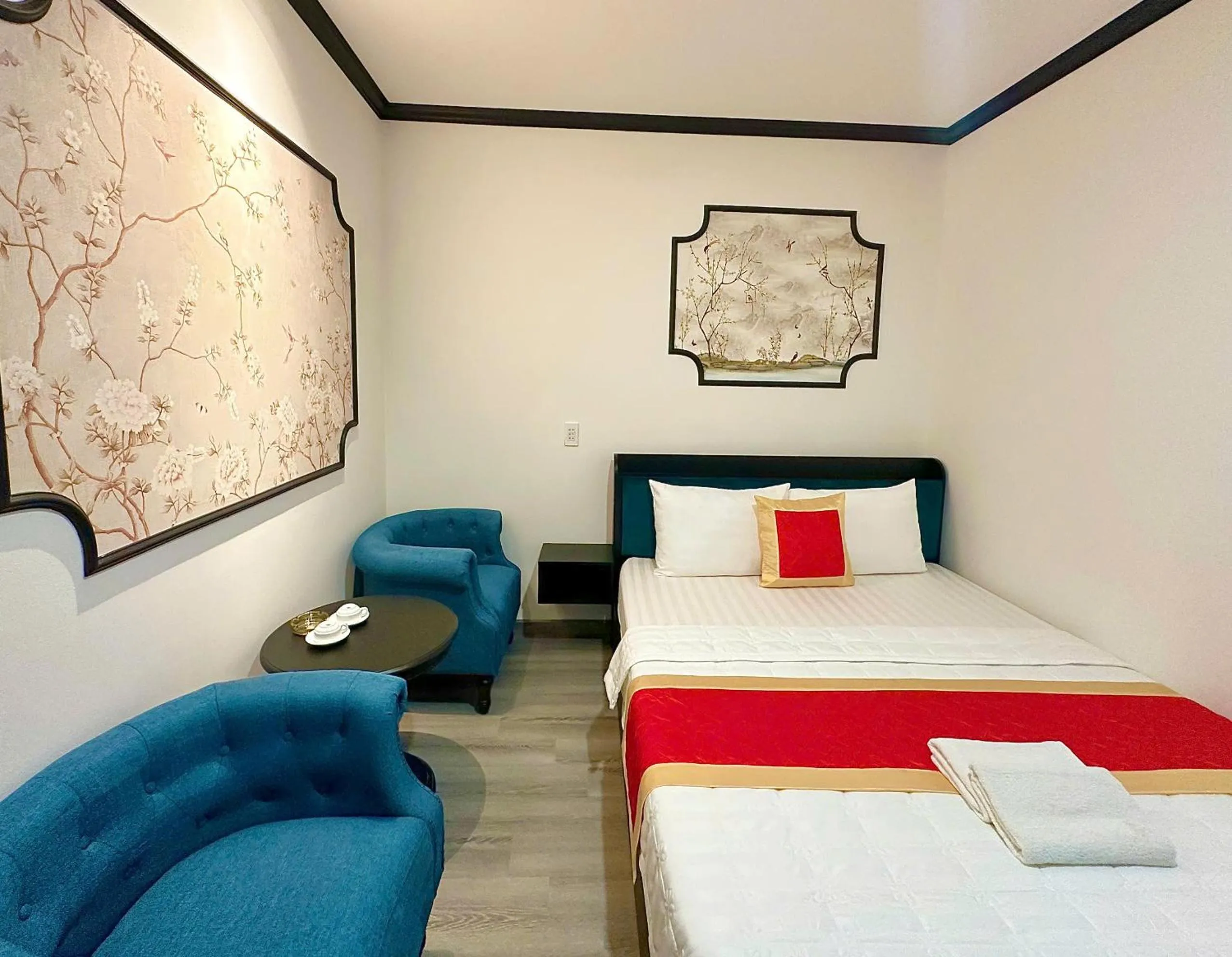 Bed in Phu Gia Hotel 193 Nguyen Thai Hoc