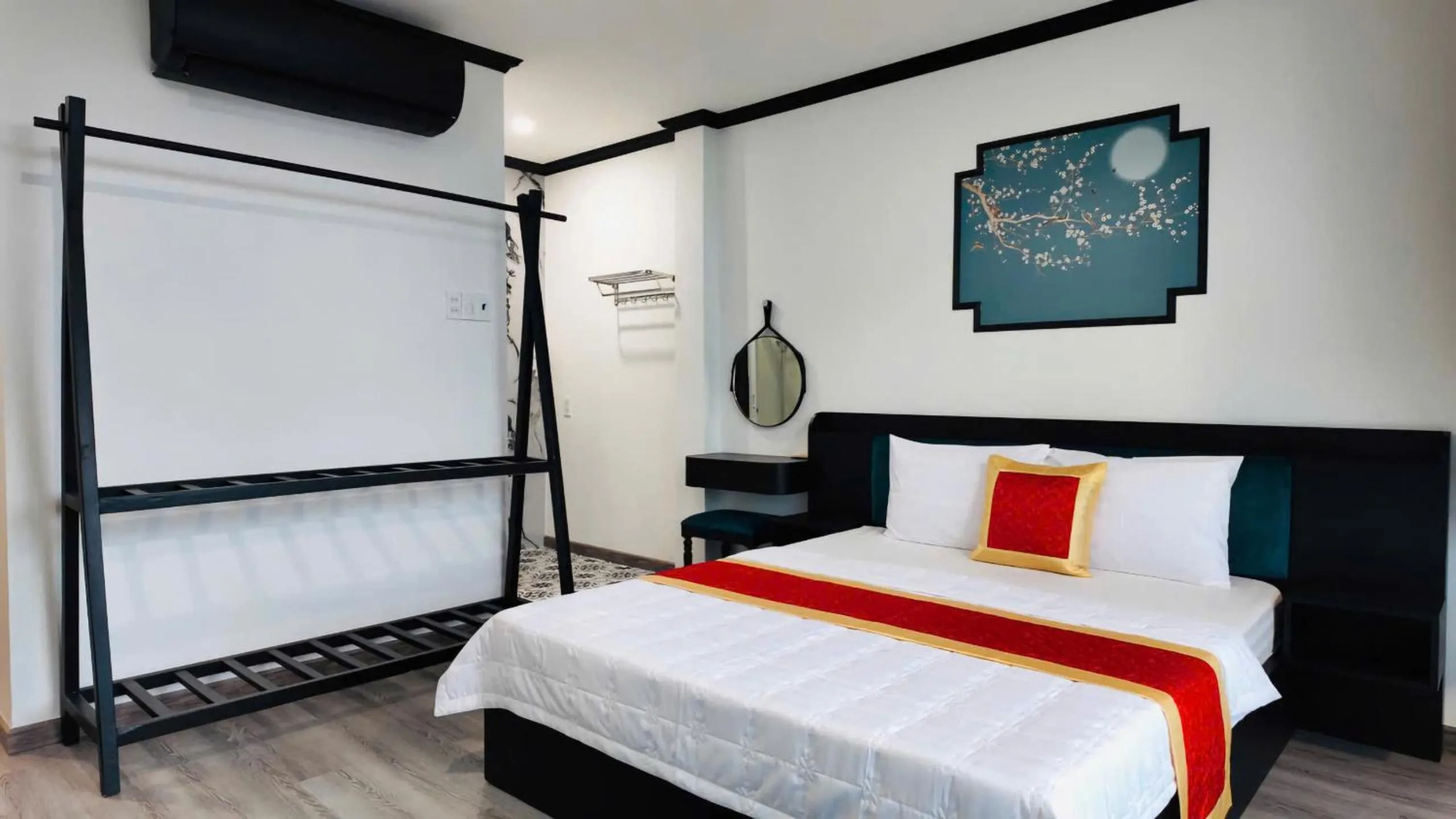 Bed in Phu Gia Hotel 193 Nguyen Thai Hoc