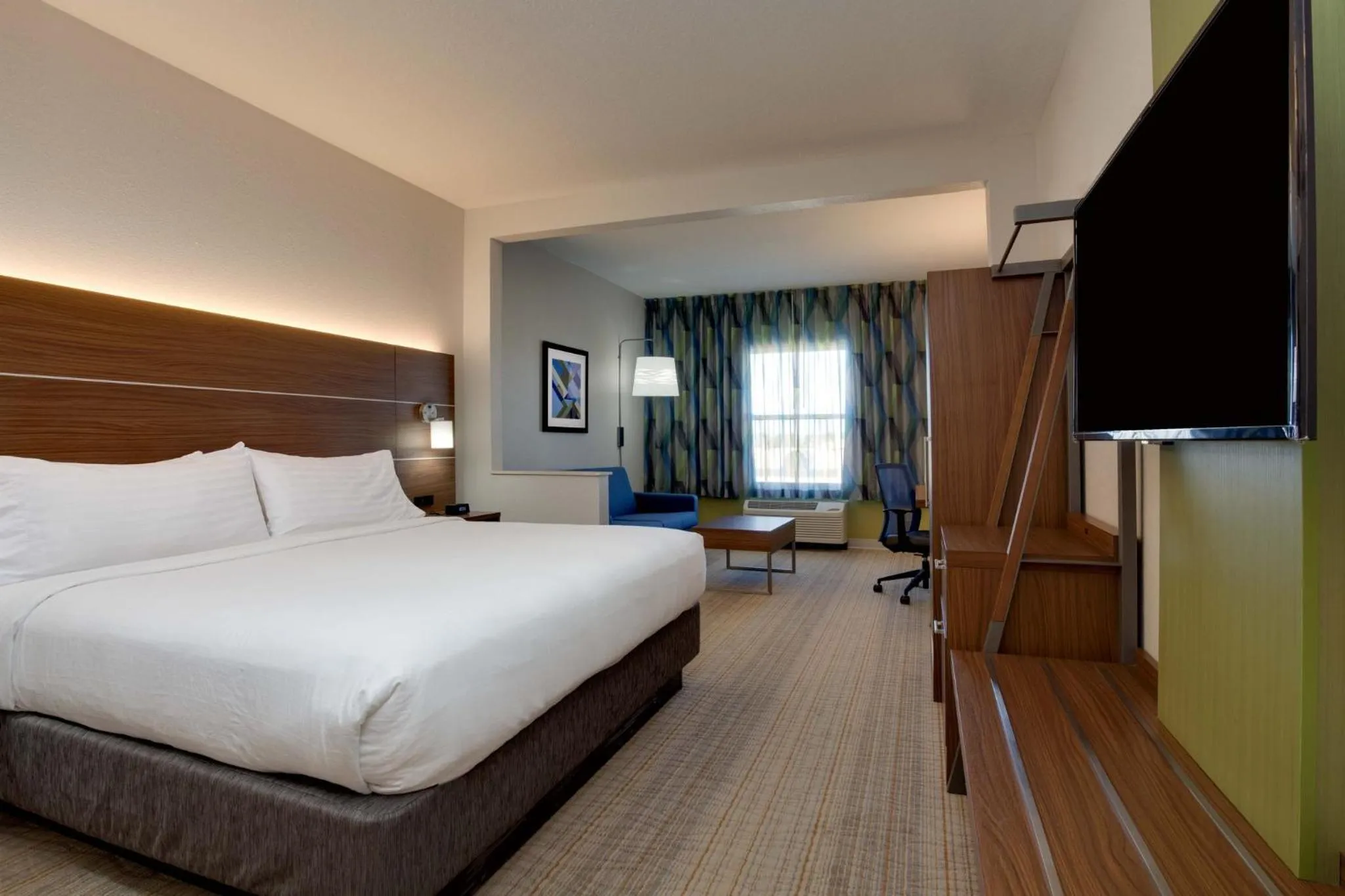Photo of the whole room, Bed in Holiday Inn Express & Suites Orlando International Airport by IHG