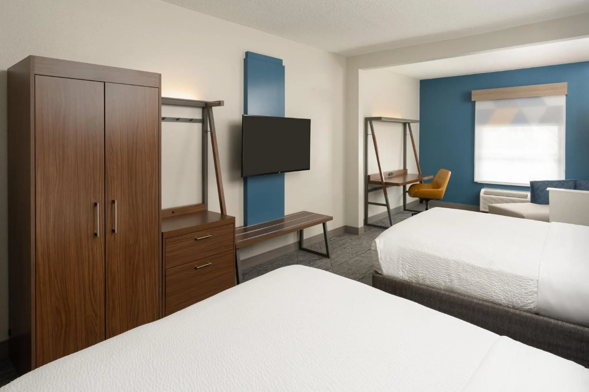Photo of the whole room, Bed in Holiday Inn Express & Suites Orlando International Airport by IHG