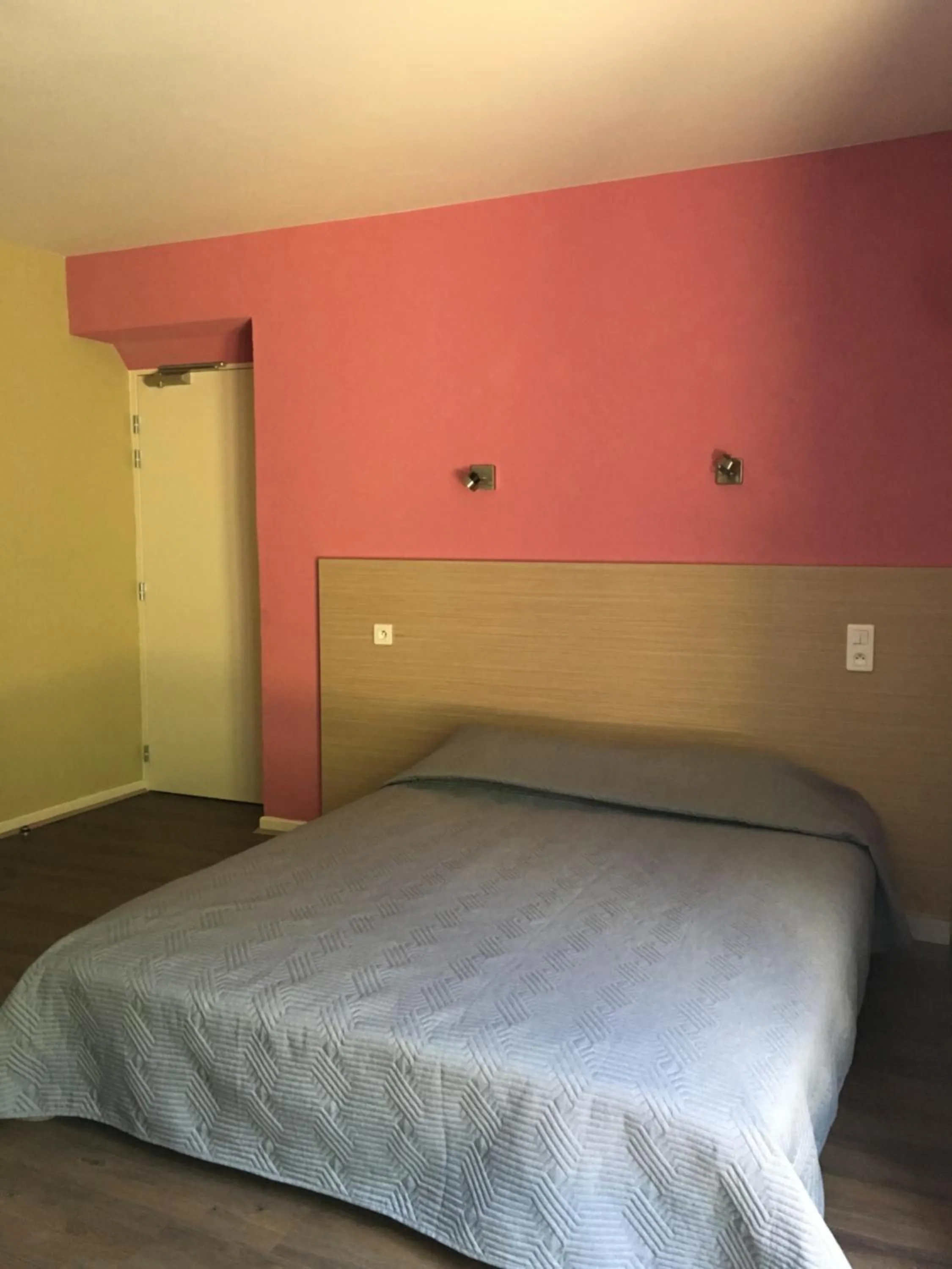 Bed in Hotel Val De Saone Lyon Caluire Rillieux