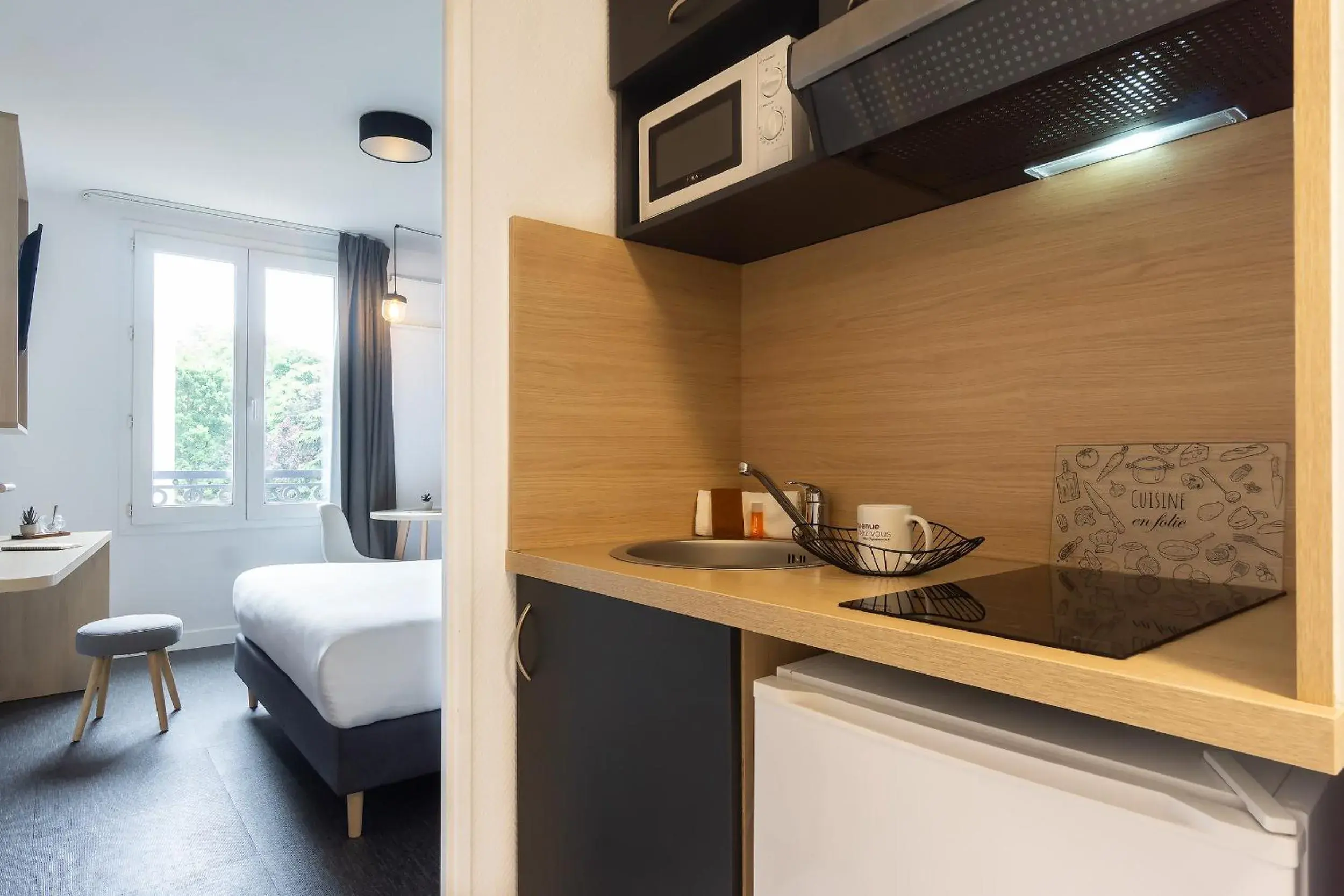 Kitchen or kitchenette, Bed in City Résidence Paris Saint-Maurice Kitchen or kitchenette, Bed in City Résidence Paris Saint-Maurice