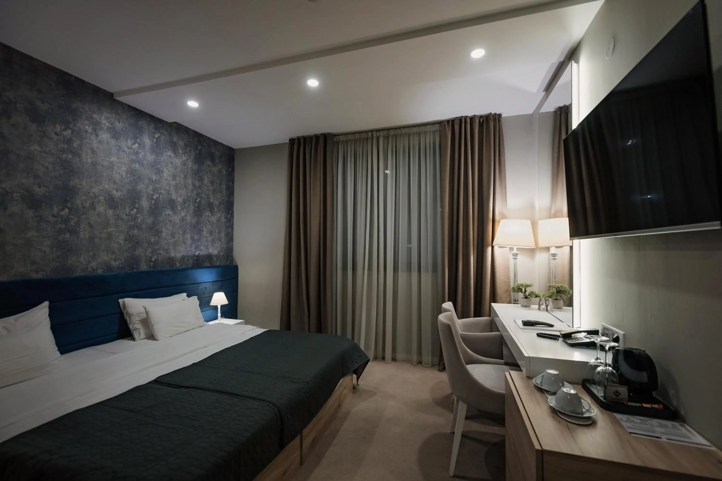 Photo of the whole room, Bed in IG Hotel