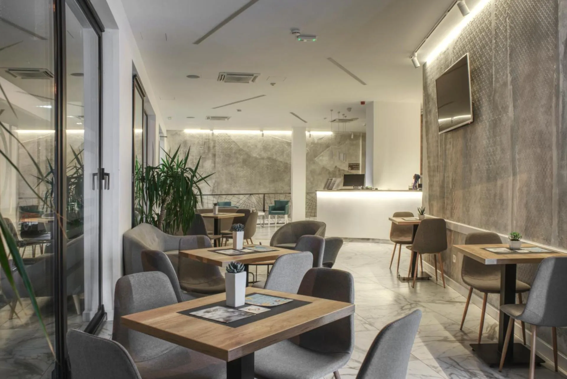 Lobby or reception in IG Hotel