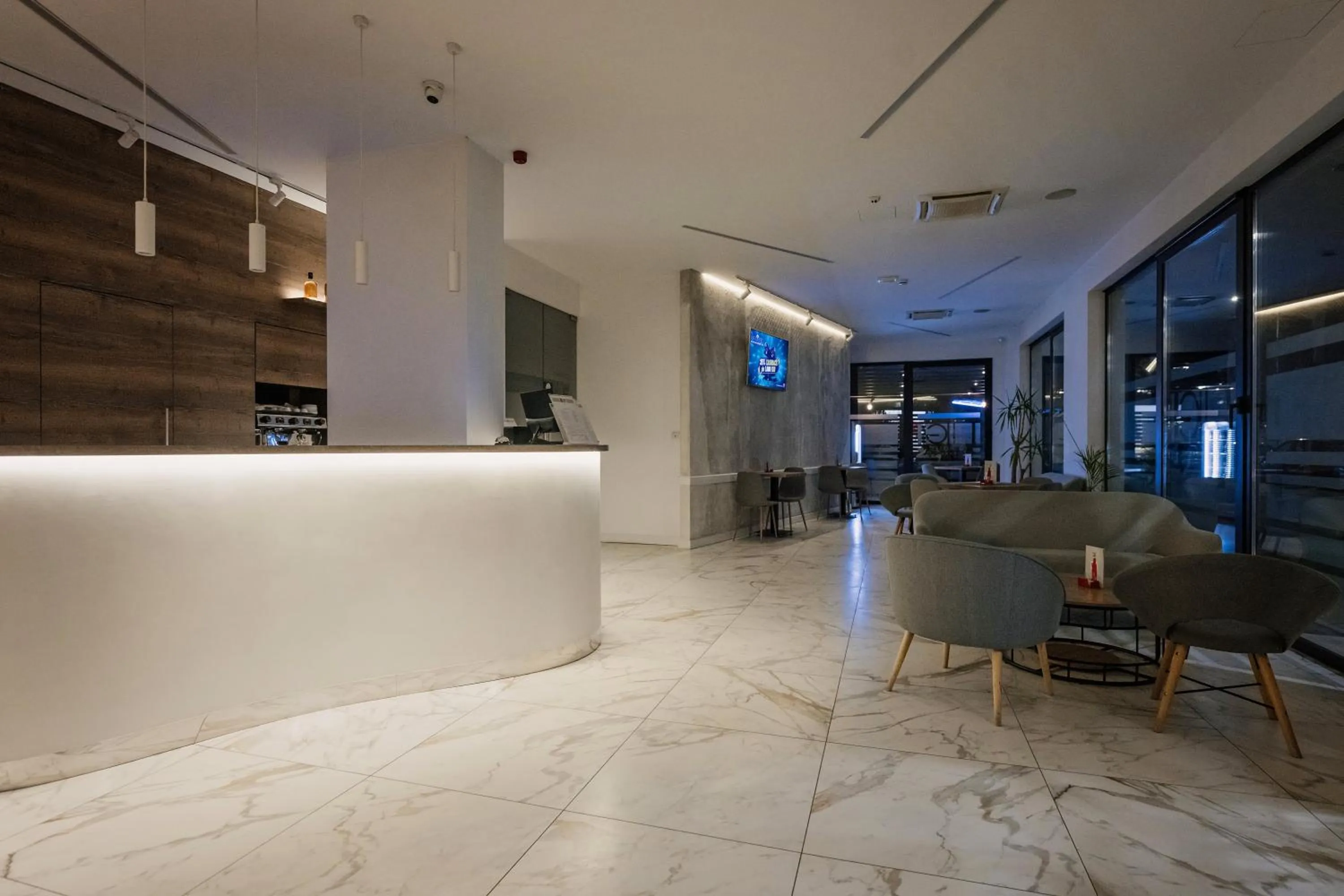 Lobby or reception in IG Hotel