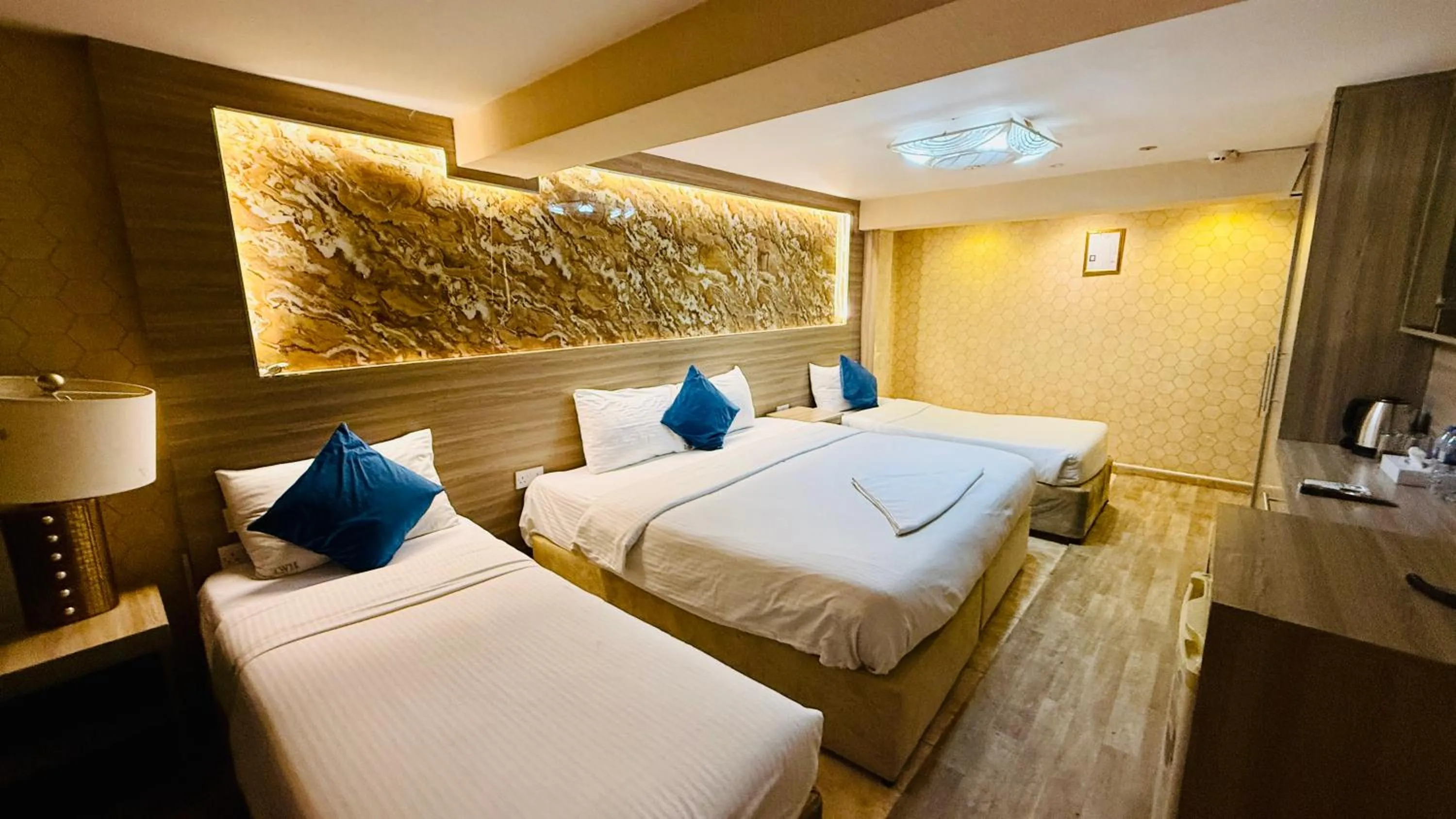 Bed in Trans World Hotel