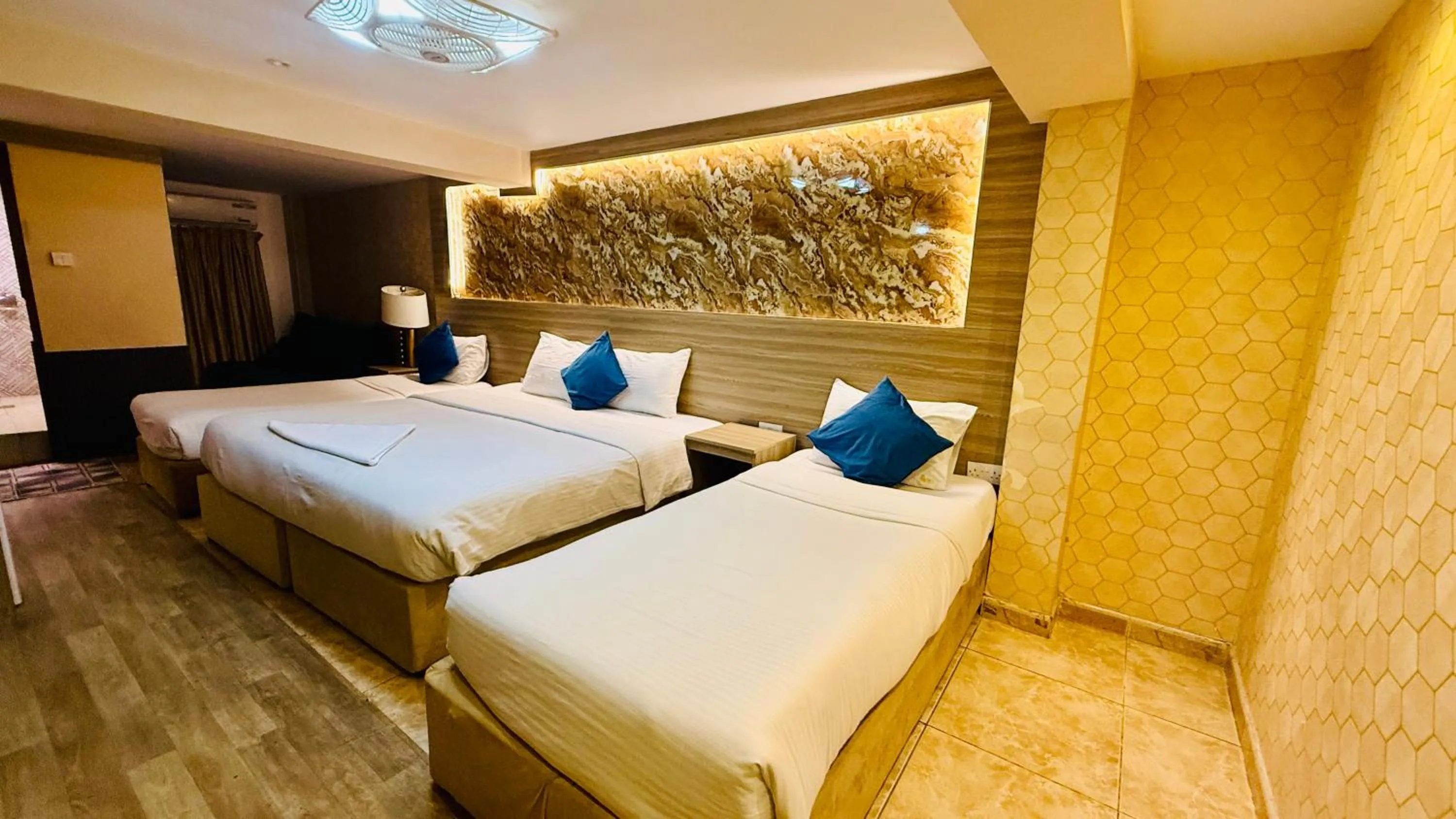 Bed in Trans World Hotel