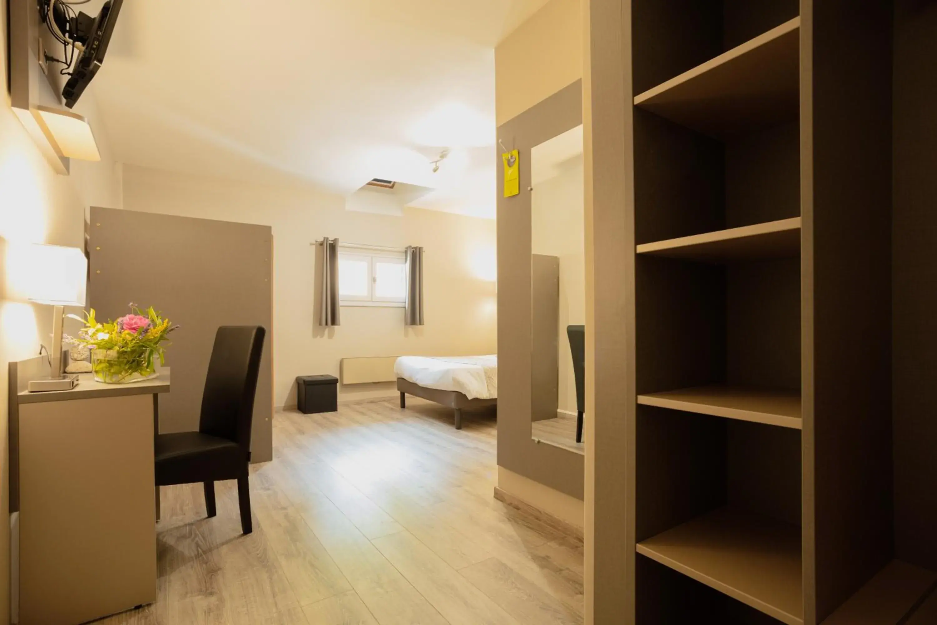 Bedroom in Logis Hotel Restaurant Family & Spa Bedroom in Logis Hotel Restaurant Family & Spa