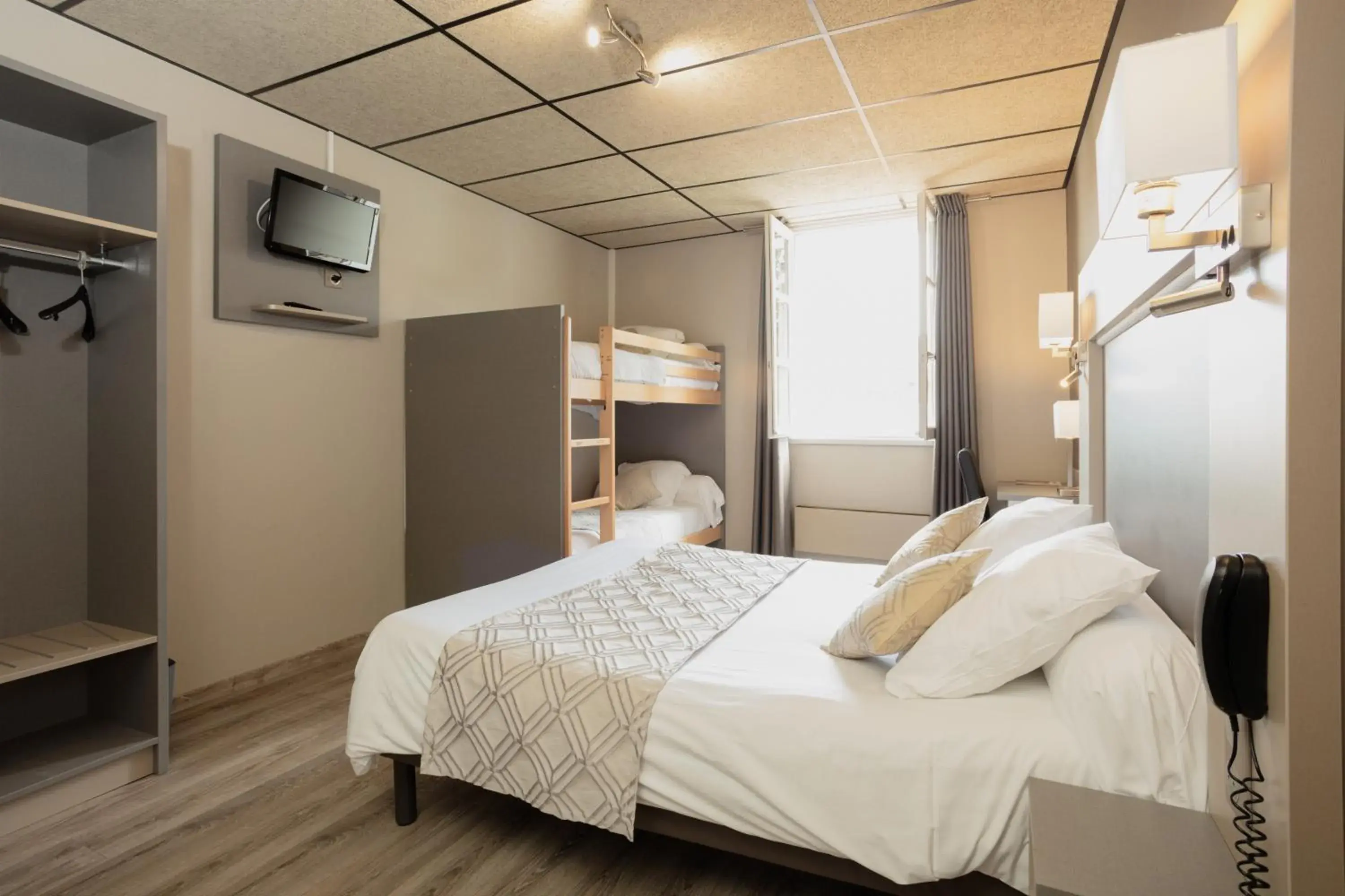 Bedroom, Bed in Logis Hotel Restaurant Family & Spa Bedroom, Bed in Logis Hotel Restaurant Family & Spa