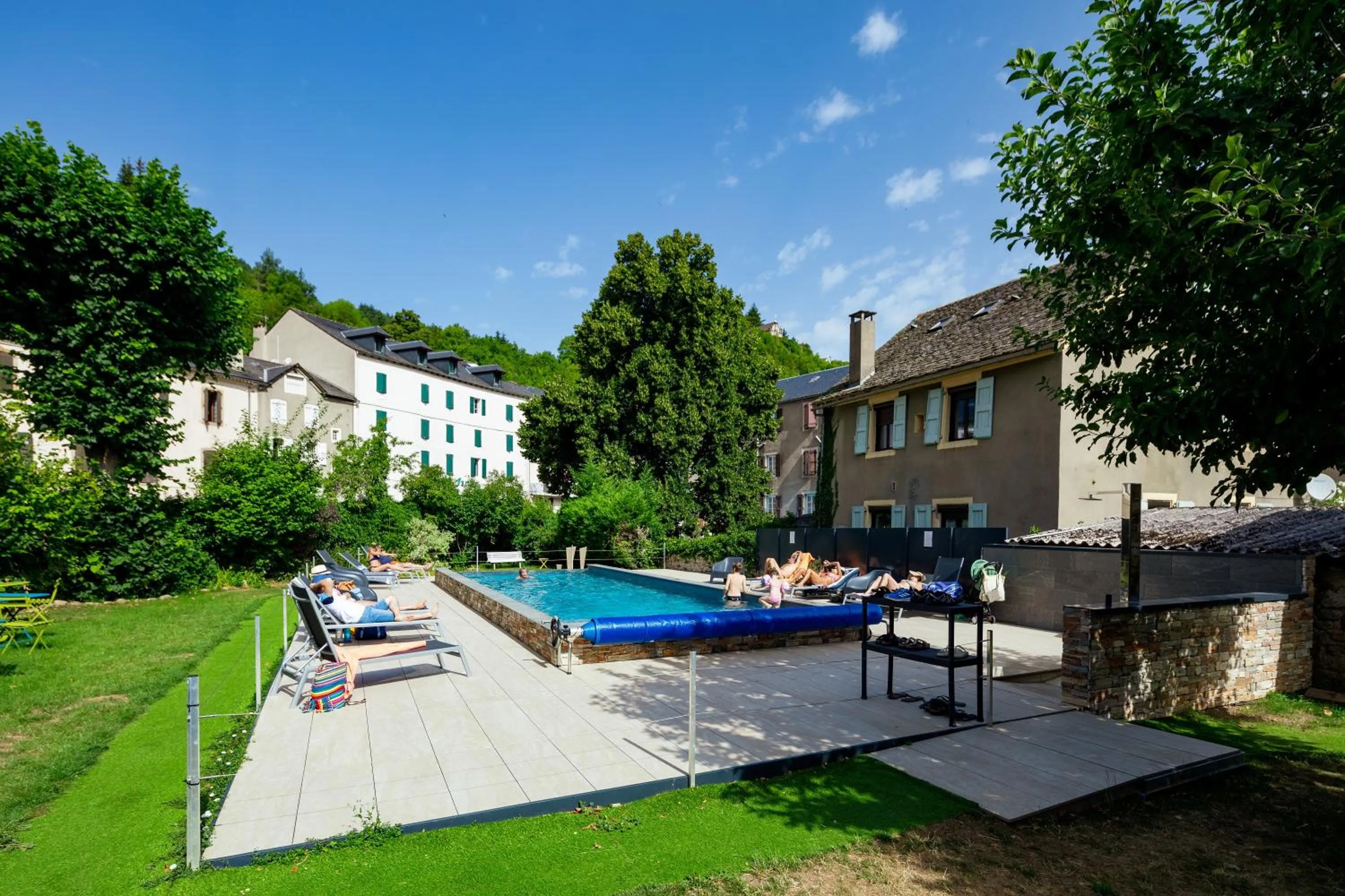 Swimming pool in Logis Hotel Restaurant Family & Spa