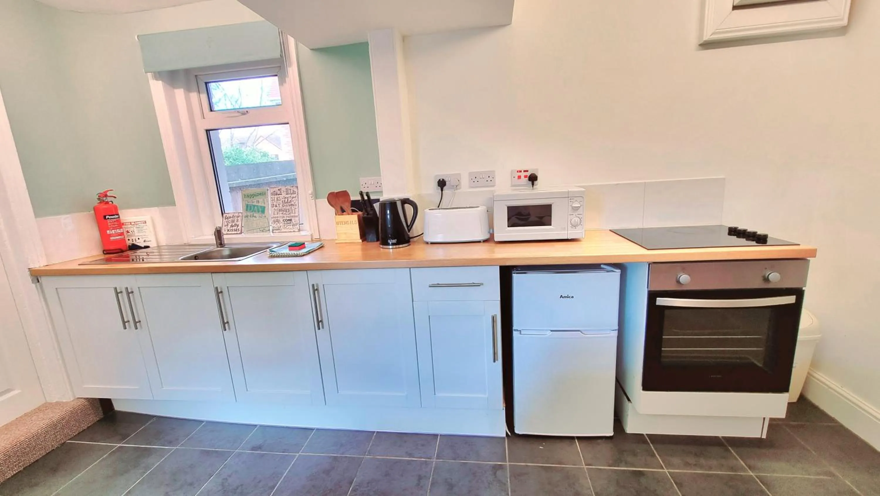 Kitchen or kitchenette in Beachcomber Holiday Apartments